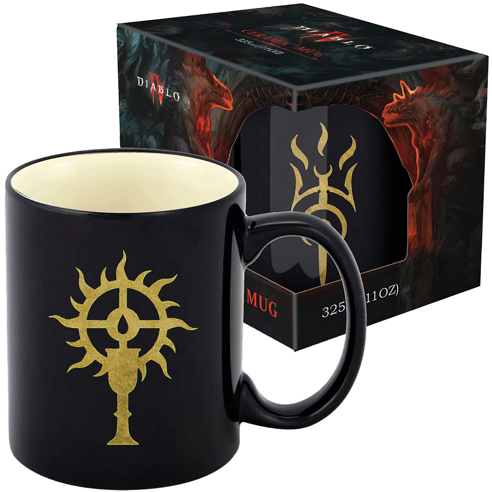 Schwarze Diablo-Tasse mit goldenem Emblem und passender Schachtel. Die Schachtel hat Diablo-Kunst. Tasse hat einen Griff, Box zeigt Text.