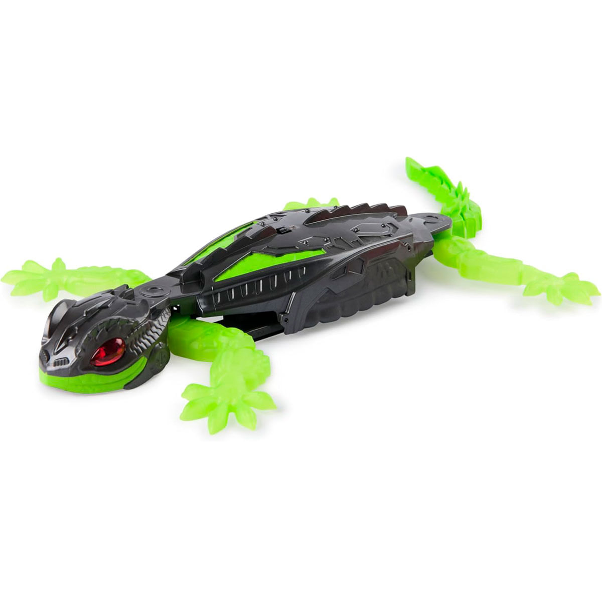 Un lagarto de juguete con partes negras y verdes, ojos rojos y extremidades verdes. Está sobre una superficie blanca.