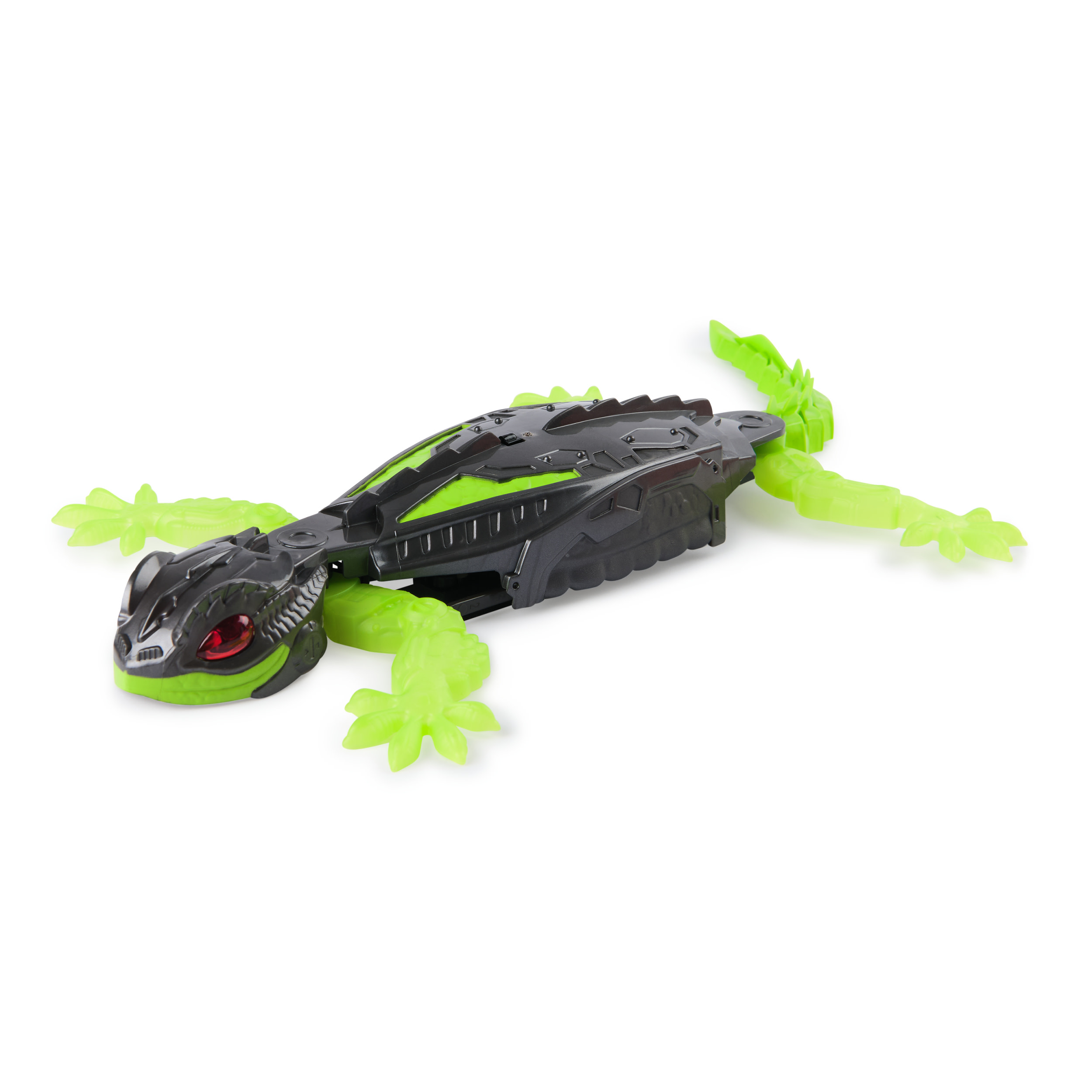 Un lagarto de juguete con partes negras y verdes, ojos rojos y extremidades verdes transparentes, sobre fondo blanco.
