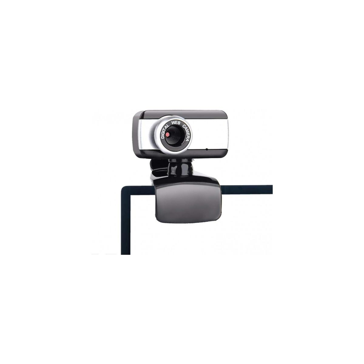 Eine Webcam, silber und schwarz, auf einem schwarzen Sockel montiert, an einer Oberfläche befestigt. Das Objektiv ist zentriert, und es steht 'Digital Web Camera'.