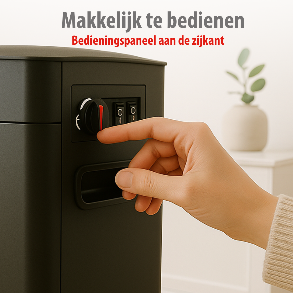 Een hand draait aan een zwarte draaiknop op een zwarte doos. Twee schakelaars rechts. Een plant in een vaas op de achtergrond.