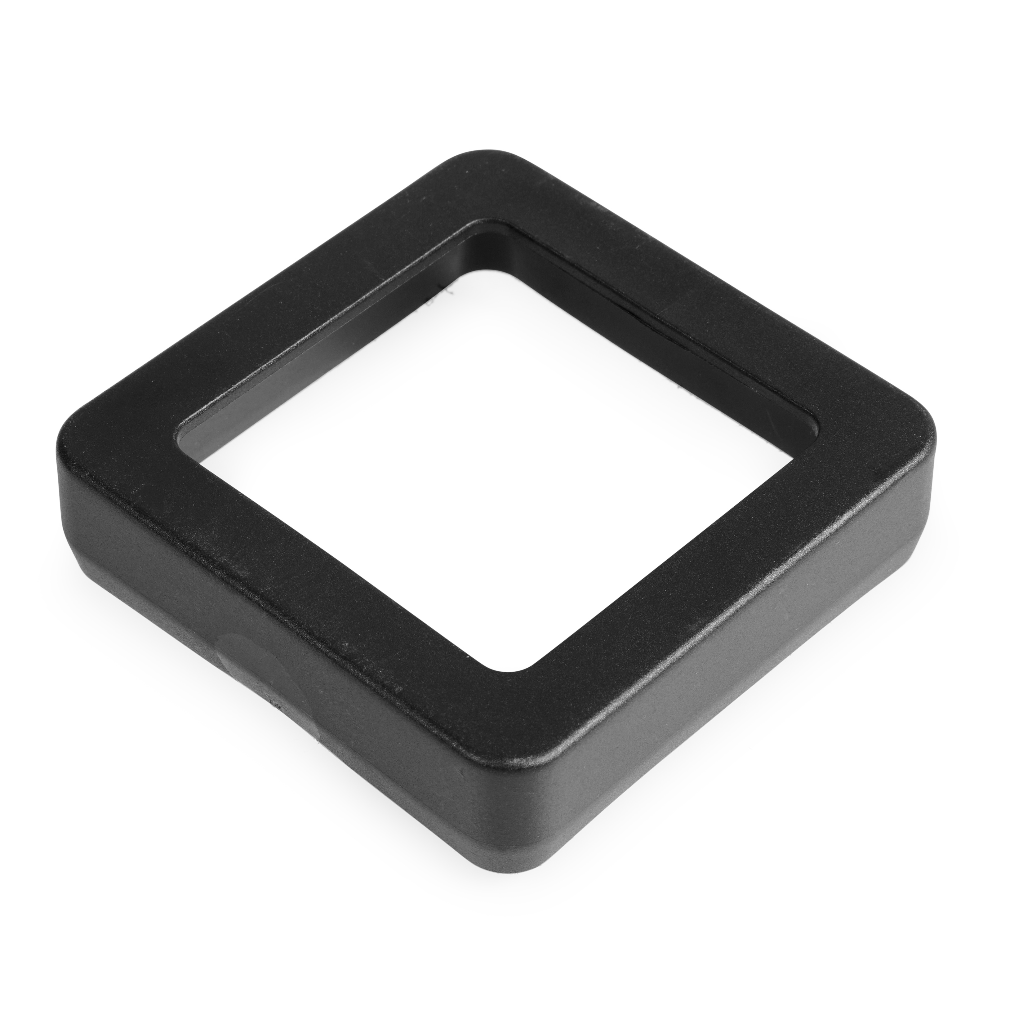 Czarna, kwadratowa ramka na białym tle. Ramka jest lekko podniesiona i ma zaokrąglone rogi.