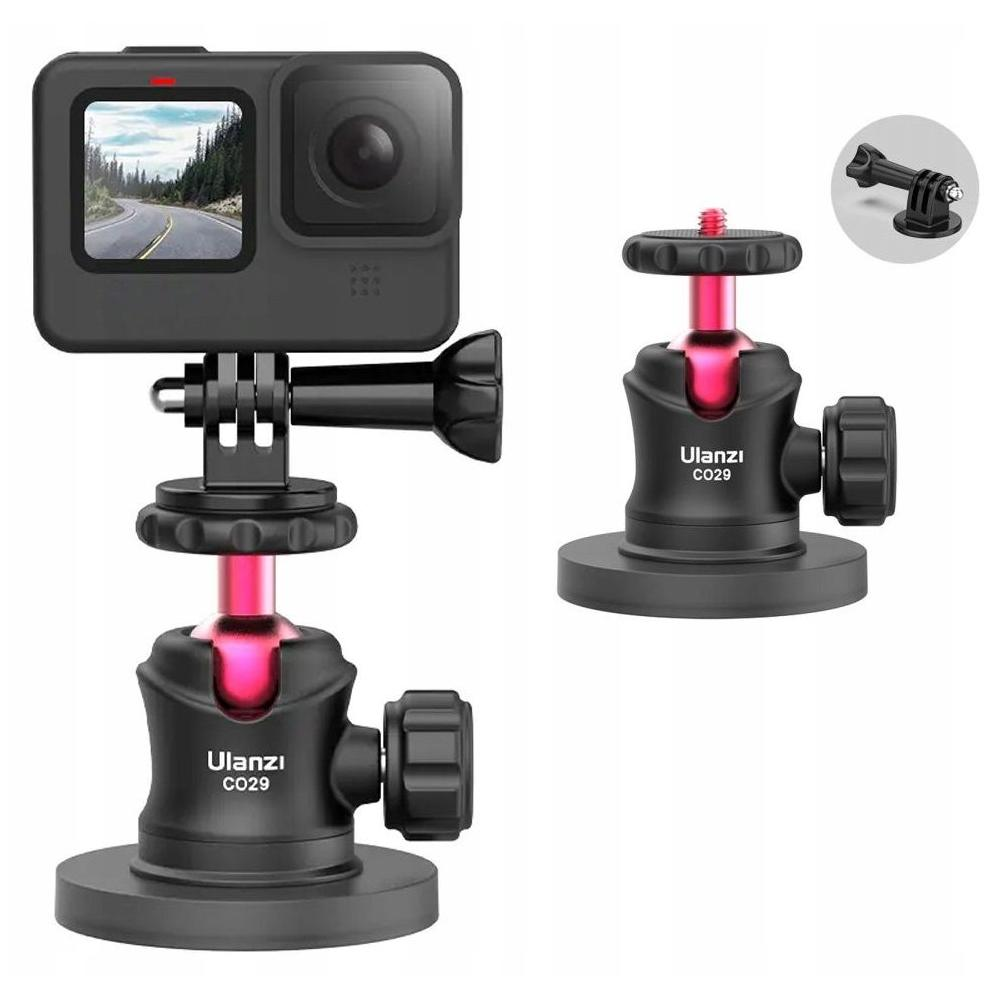 Kamera zamontowana na statywie. Kamera wyświetla scenę drogową. Statyw jest czarny i różowy i ma markę Ulanzi CO29.