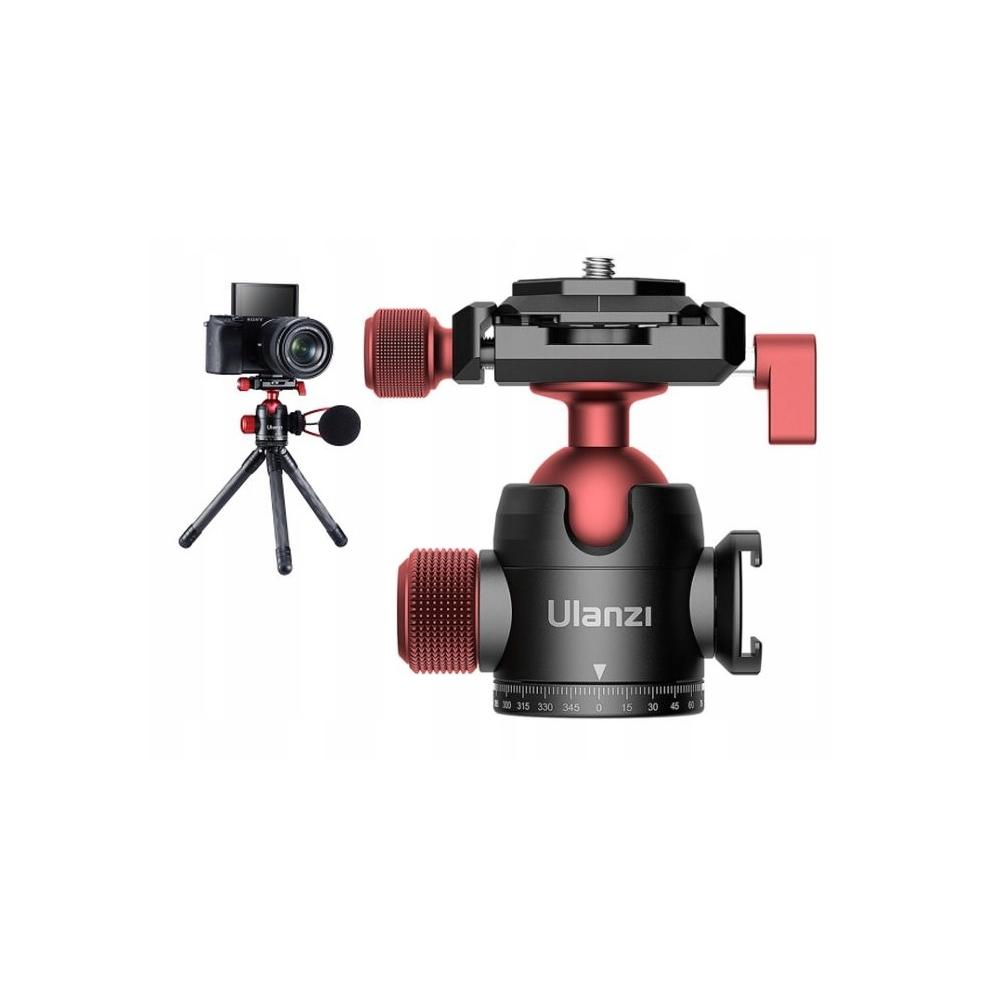 Statyw do aparatu i głowica kulowa. Statyw trzyma aparat. Głowica kulowa jest czarna i czerwona, z marką 'Ulanzi'.