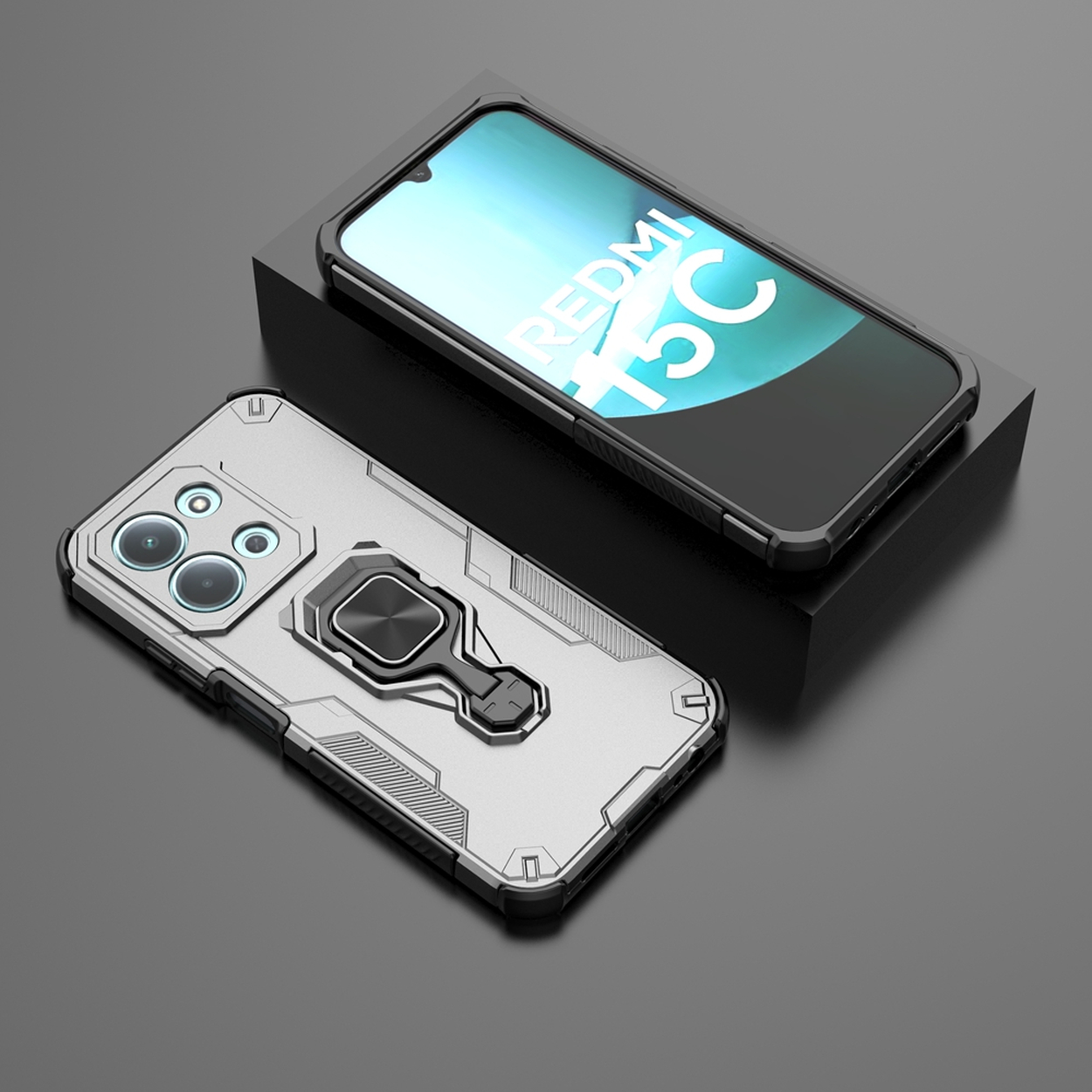 Twee smartphones met hoesjes worden getoond. Eén telefoon staat op een zwarte standaard, de andere op een grijs oppervlak. De telefoon op de standaard heeft REDMI T5C op het scherm.