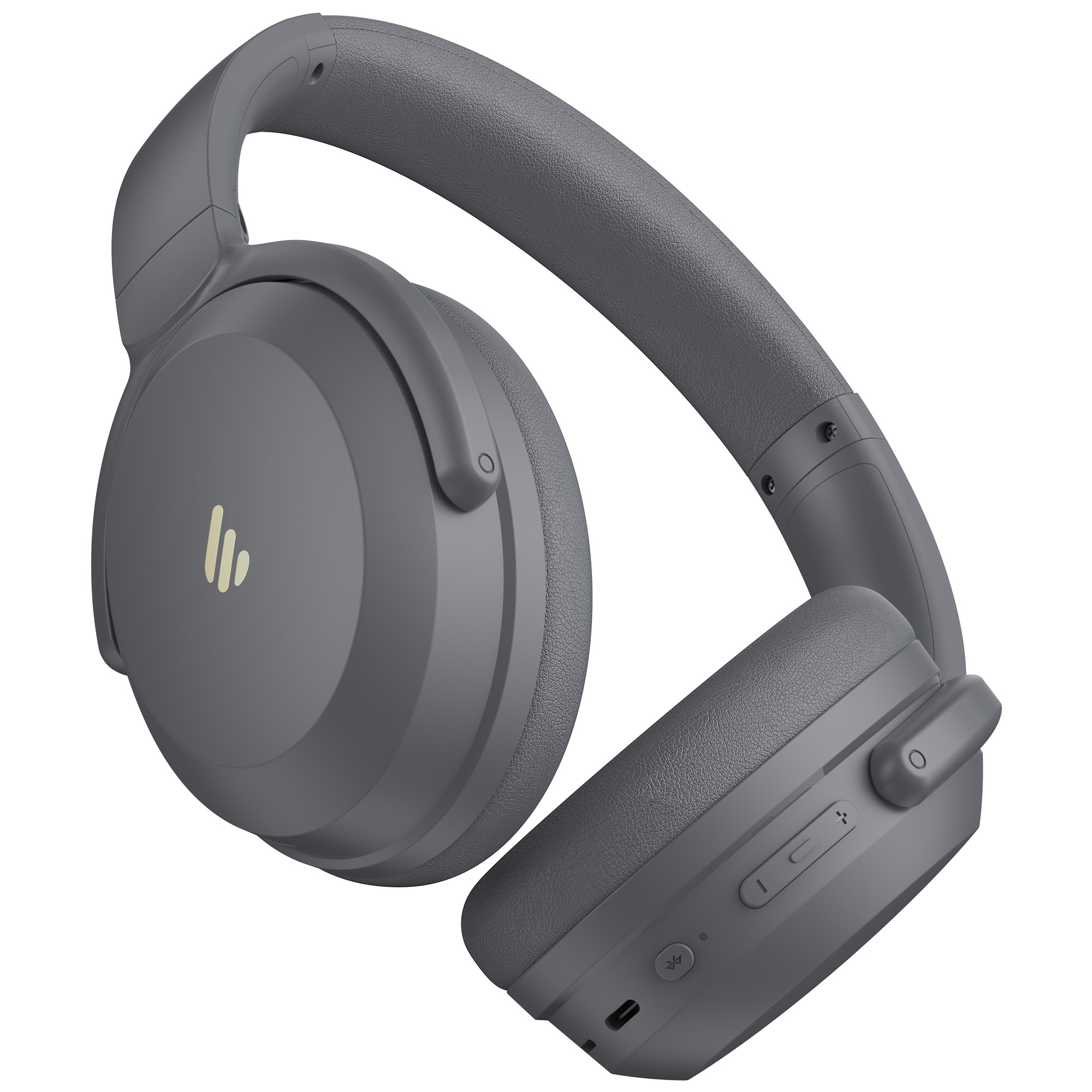 Szare słuchawki na białym tle. Słuchawki są pod kątem, pokazując nauszniki i pałąk.