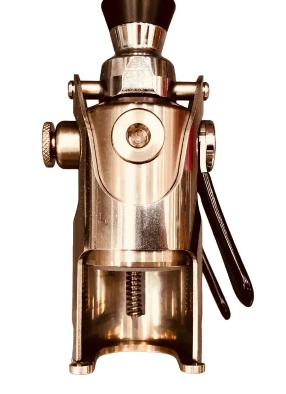 Een metalen champagneflesstopper. Het heeft een zwarte handgreep en een zwarte bovenkant. De stopper is koperkleurig.