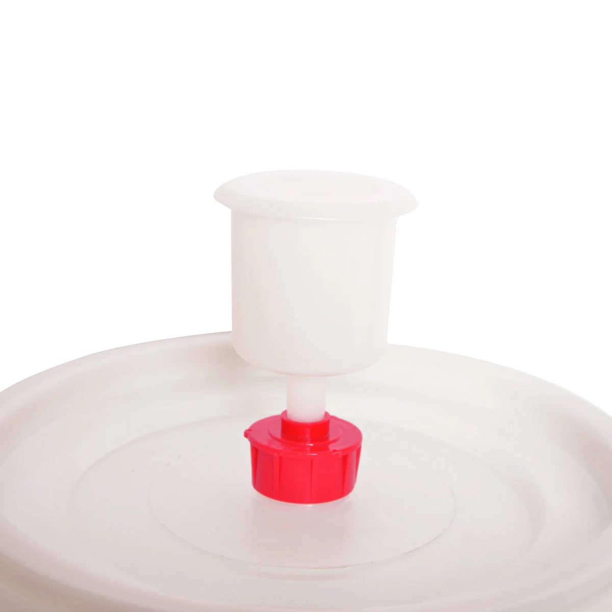 A white fermentation lock is inserted into a white plastic lid. A red cap is at the bottom of the lock. White background.