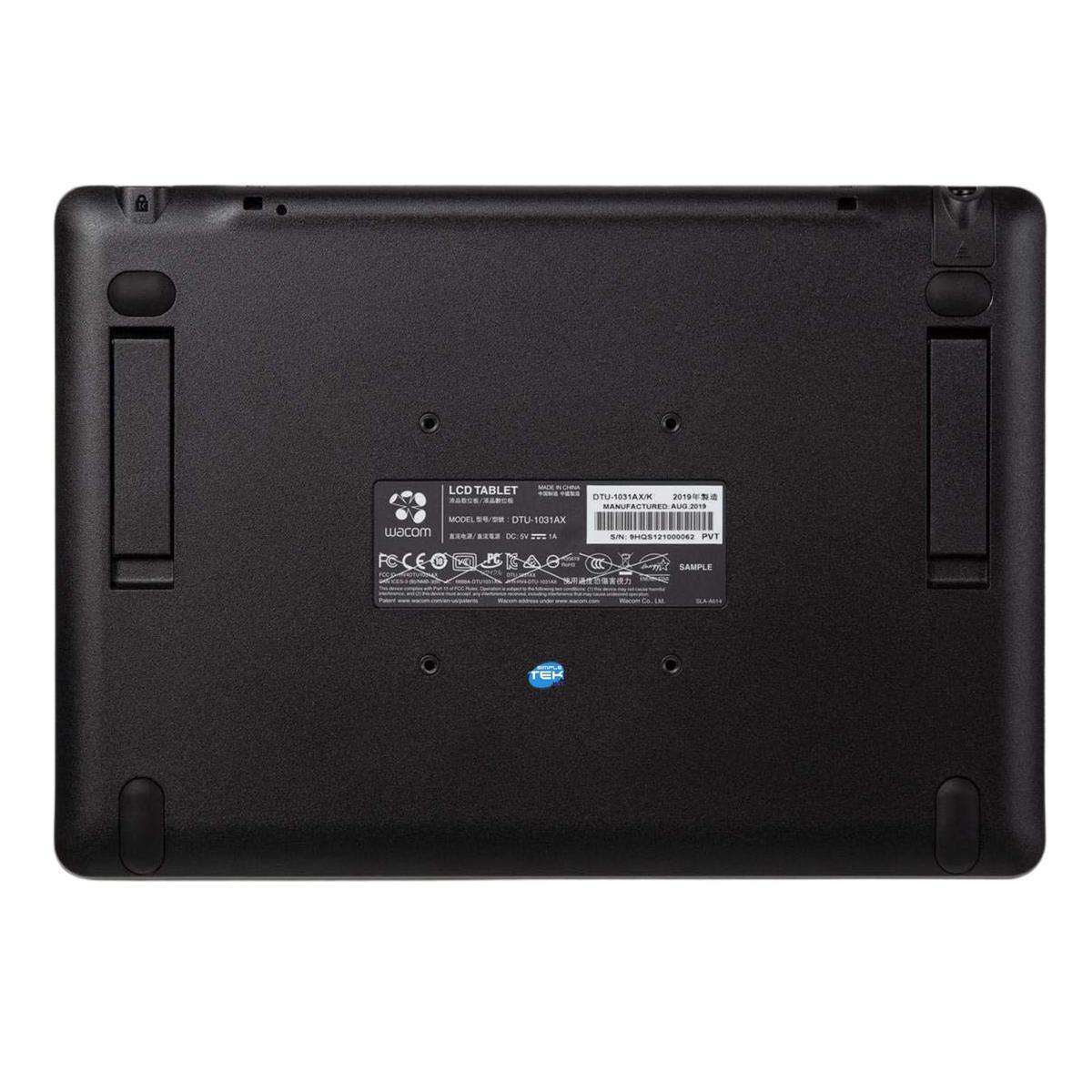 Retro tablet LCD Wacom nero. Modello DTU-1031AX. Include etichette con specifiche, loghi e logo 'TEK'. Prodotto in Cina.