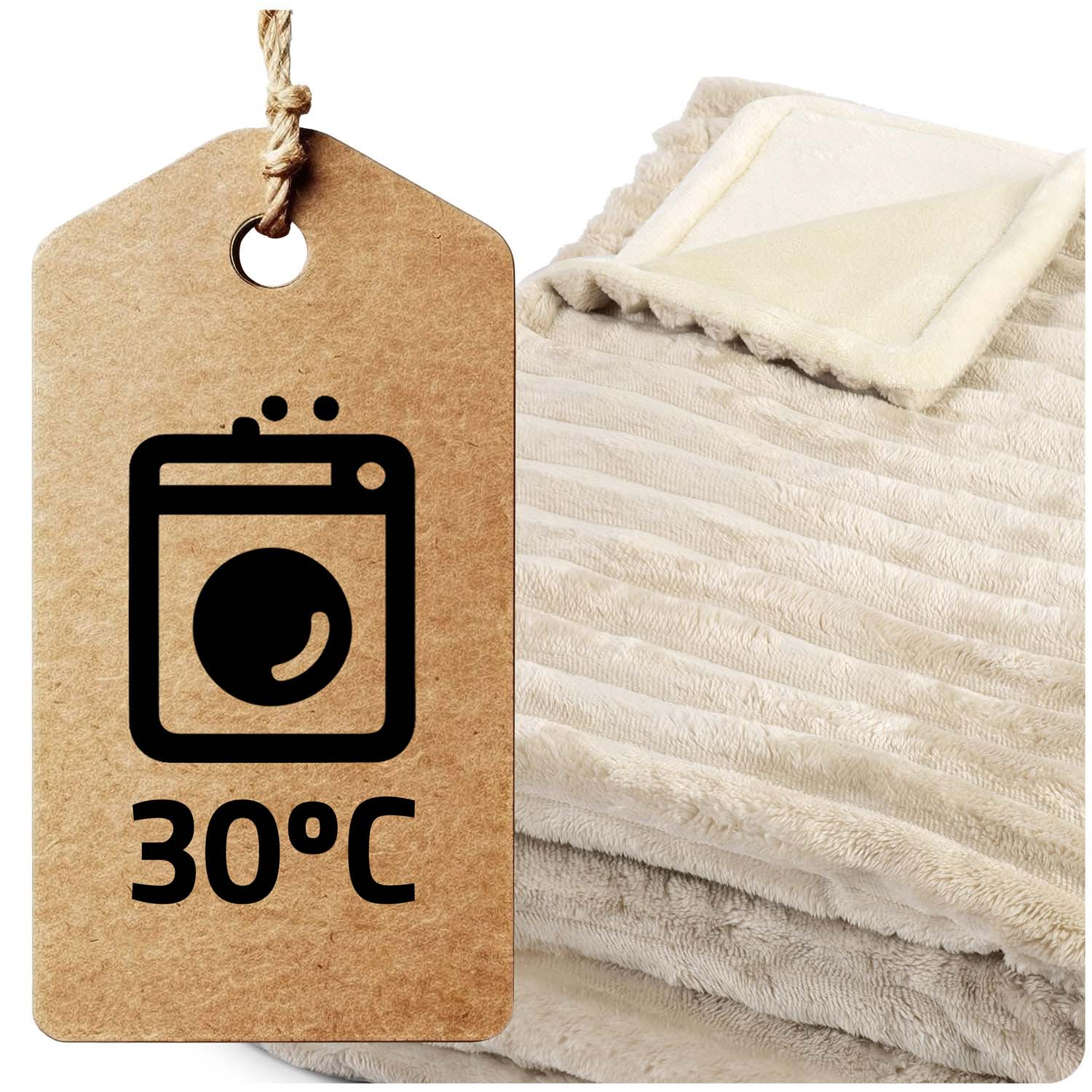 Beżowy koc z etykietą przedstawiającą symbol pralki i 30°C. Koc jest złożony, o miękkiej fakturze.
