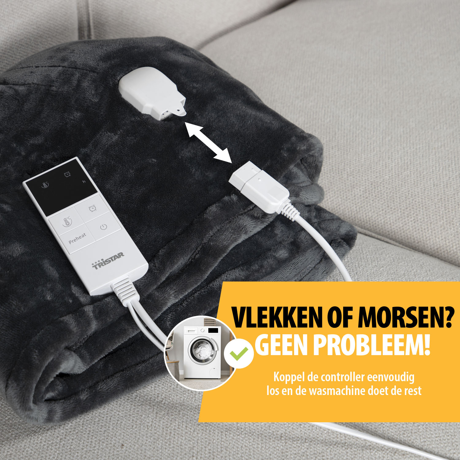 A dark gray heated blanket with a white controller. A white connector is detached. Text says, 'Stains or spills? No problem!'