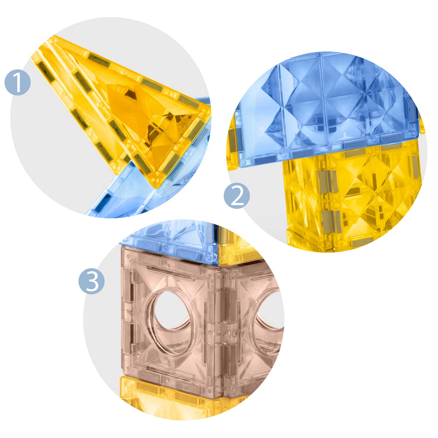 Zbliżenie kolorowych płytek magnetycznych: żółte trójkąty, niebieskie kwadraty i brązowe bloki. Płytki są ułożone tak, aby pokazać ich różne kształty.