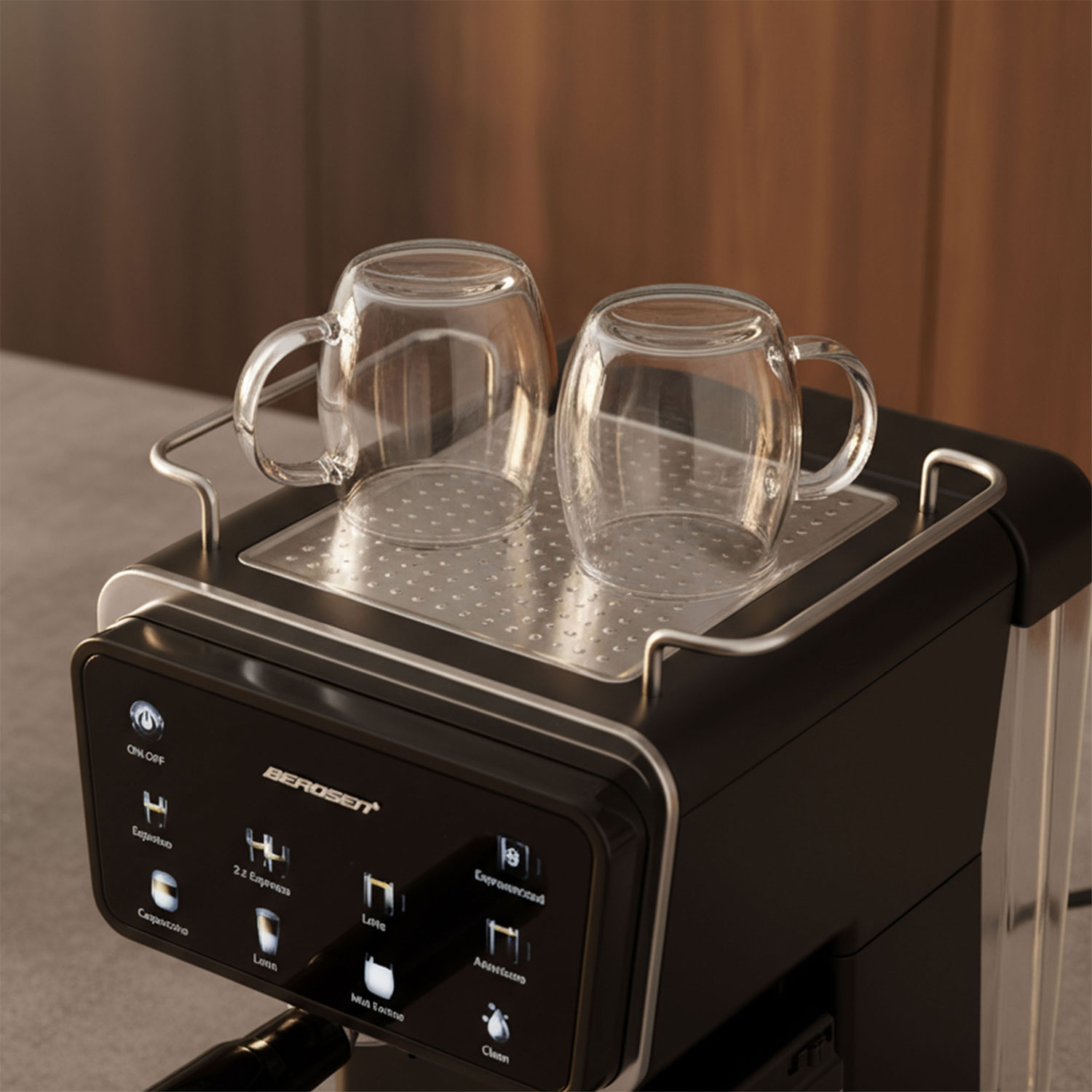 Zbliżenie czarnego ekspresu do kawy z dwoma szklanymi kubkami na górze. Ekspres ma cyfrowy wyświetlacz i różne przyciski.