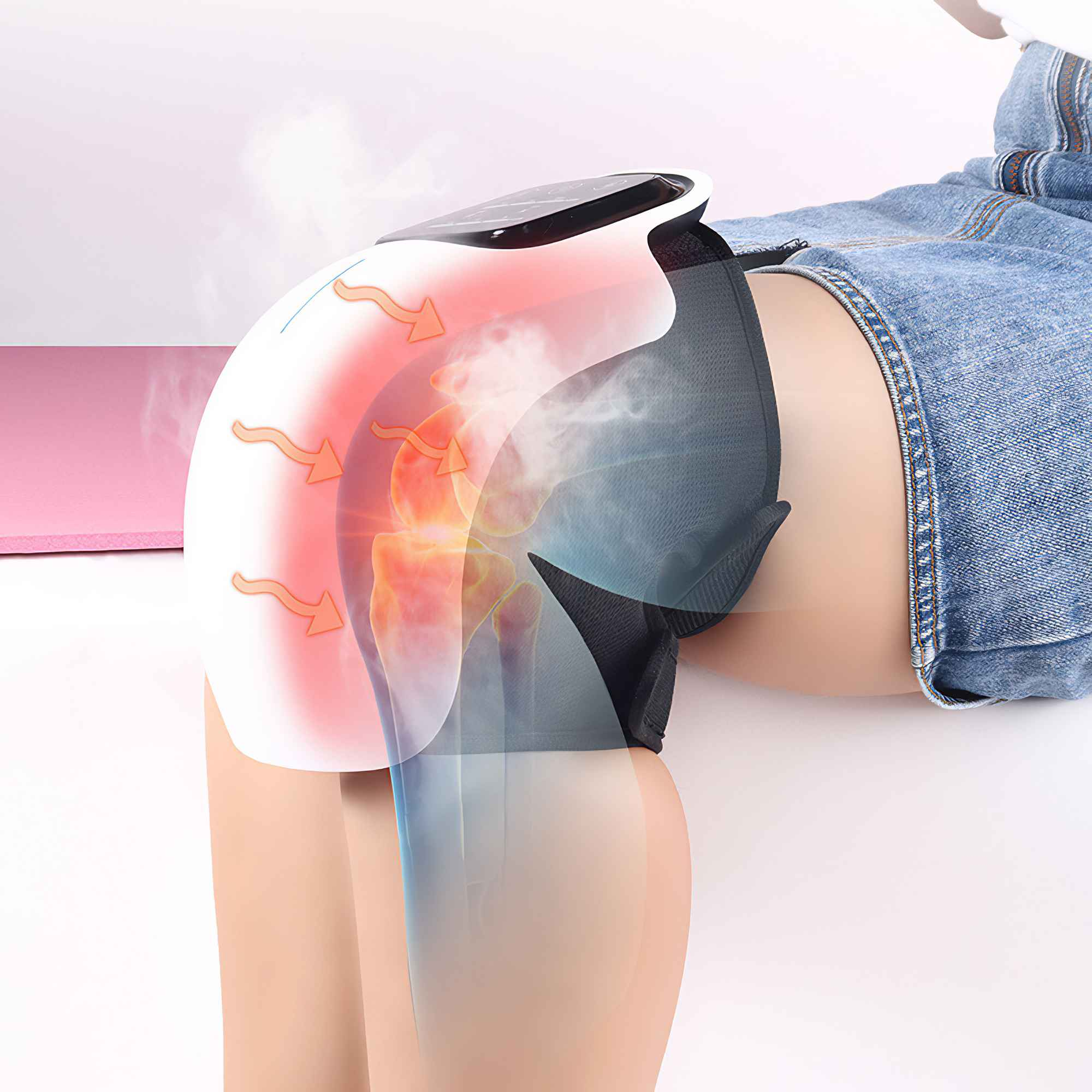 Ein Knie mit einem medizinischen Gerät. Das Gerät ist weiß und schwarz, mit roten und orangen Wärmeindikatoren.