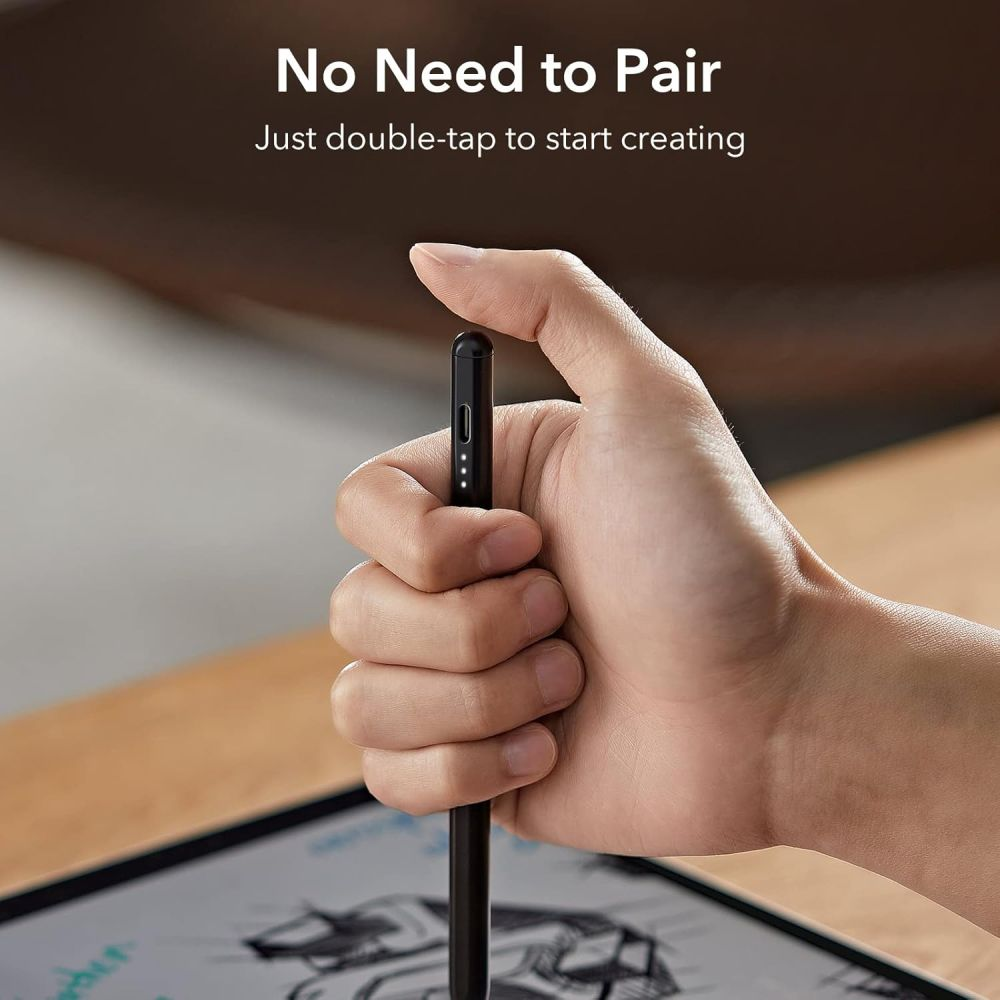 Eine Hand hält einen schwarzen Stift. Der Text oben lautet 'No Need to Pair' und 'Just double-tap to start creating'.