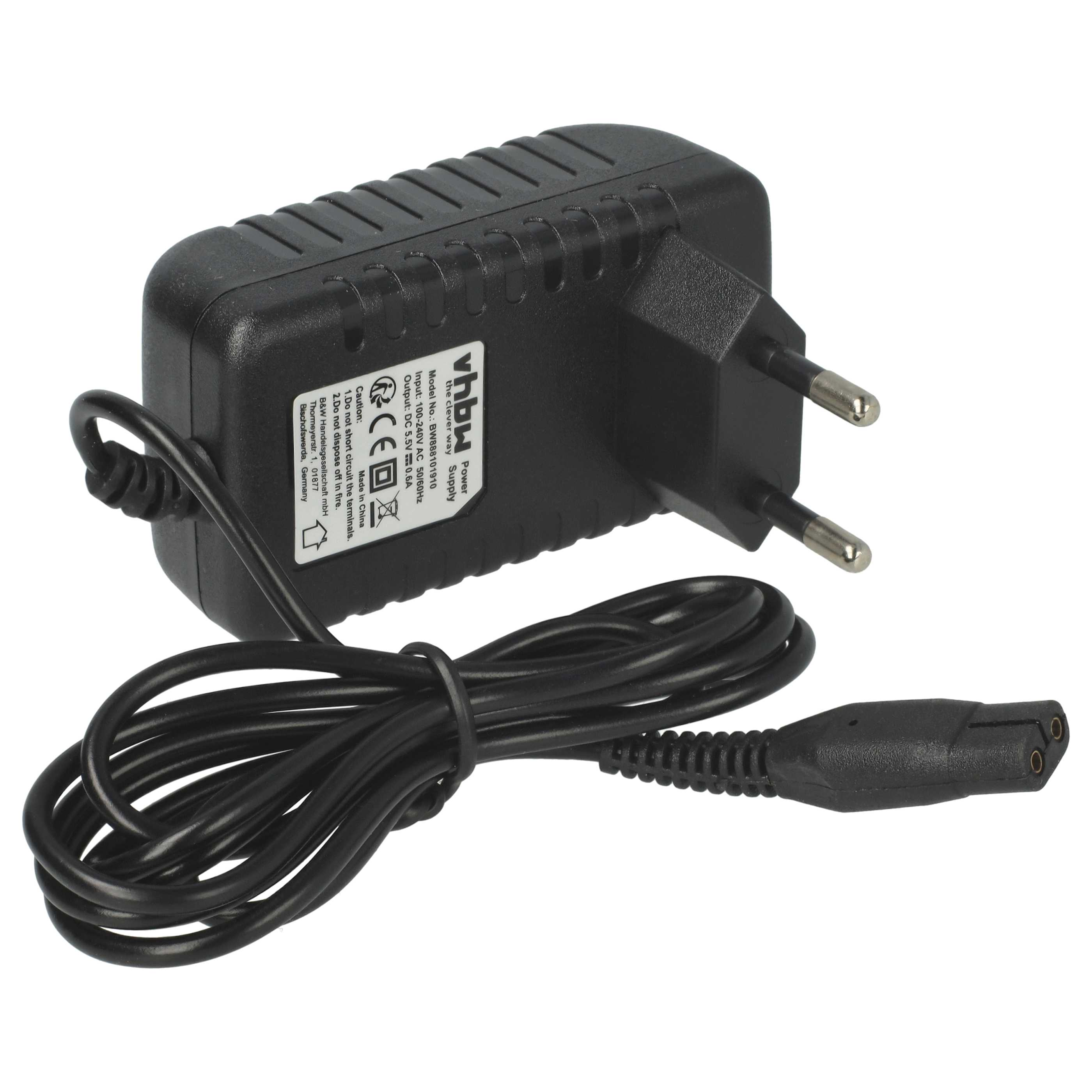 Ein schwarzes Netzteil mit schwarzem Kabel und Stecker. Es hat weißen Text und Logos.