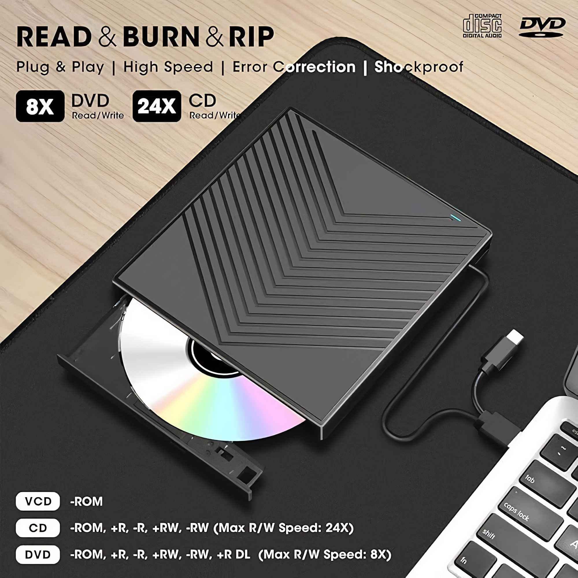 Ein schwarzes externes DVD-Laufwerk mit eingelegter CD, verbunden mit einer Laptop-Tastatur. Text: Read & Burn & Rip.