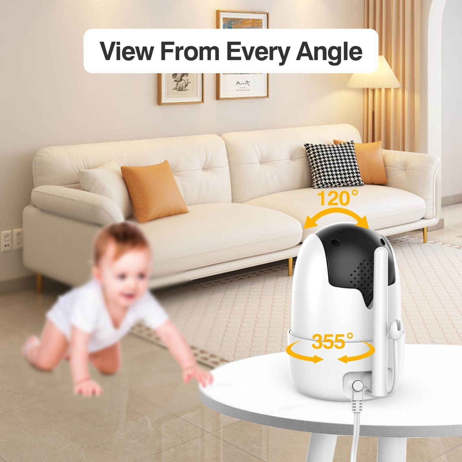 Babymonitor auf dem Tisch, Baby krabbelt. Sofa und Raum im Hintergrund. Zeigt 120- und 355-Grad-Blickwinkel.