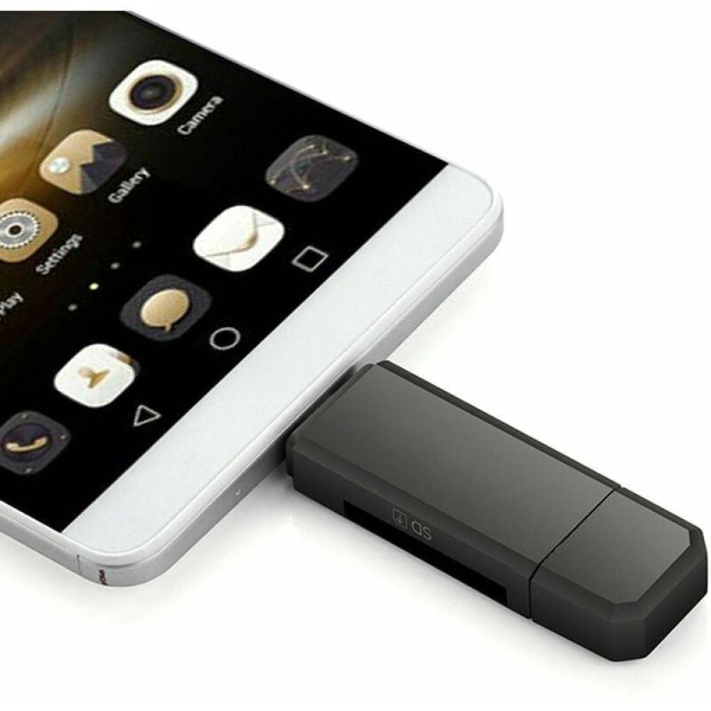 Ein Smartphone neben einem schwarzen SD-Kartenleser. Der Bildschirm des Telefons zeigt App-Symbole. Beide Objekte befinden sich auf einer weißen Oberfläche.