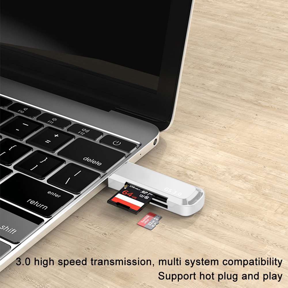 Ein Laptop mit einem Kartenleser. Zwei SD-Karten befinden sich im Leser. Der Text unten lautet '3.0 Highspeed-Übertragung'.