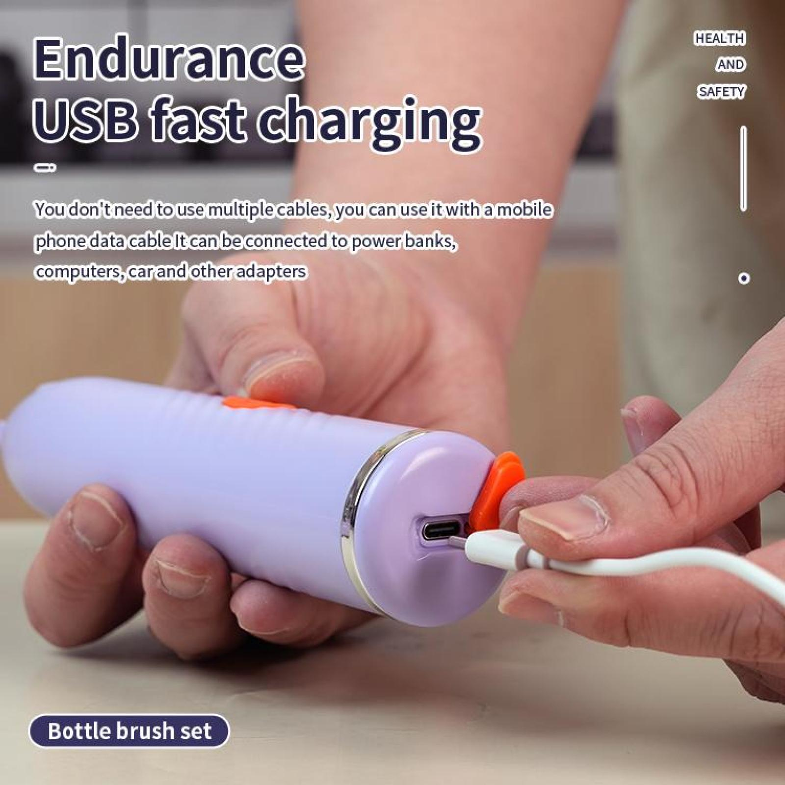 Eine Hand hält ein Ladegerät. Text sagt: Endurance USB Schnellladung. Das Gerät ist lila mit einem orangenen Teil.