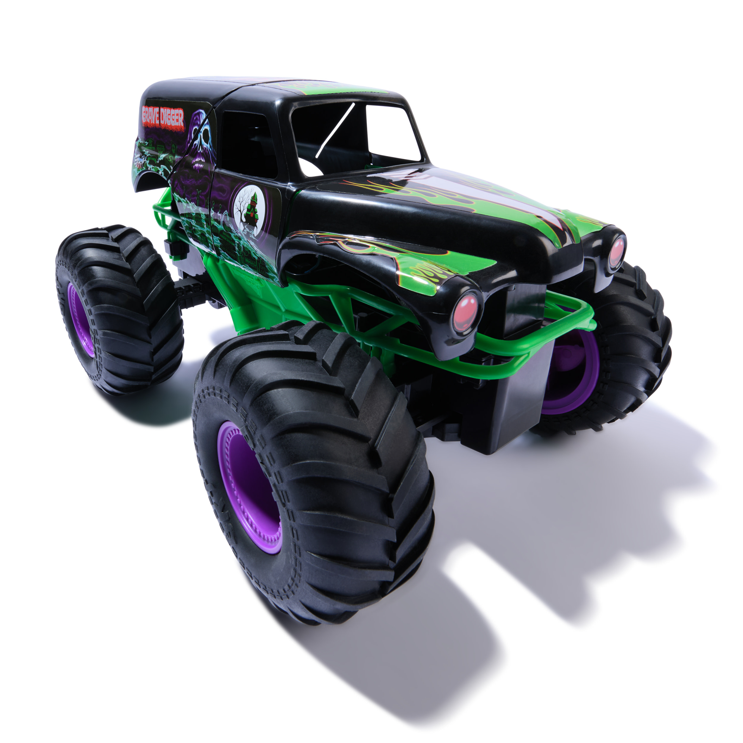 Zabawkowy monster truck, czarny korpus, zielone i czarne detale, duże czarne opony z fioletowymi felgami i napis 'Grave Digger'.