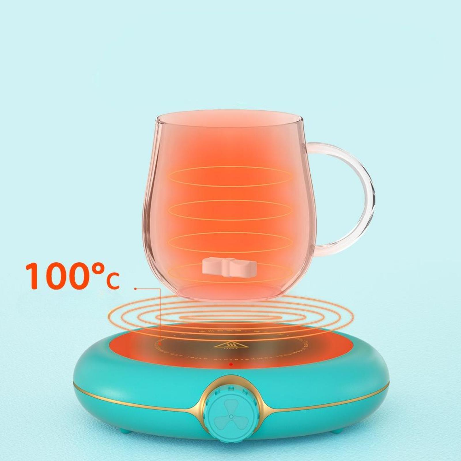 Ein Glasbecher steht über einem Induktionsheizer. Der Becher hat eine orange Flüssigkeit und zeigt 100°C an. Der Heizkörper ist türkis und orange.