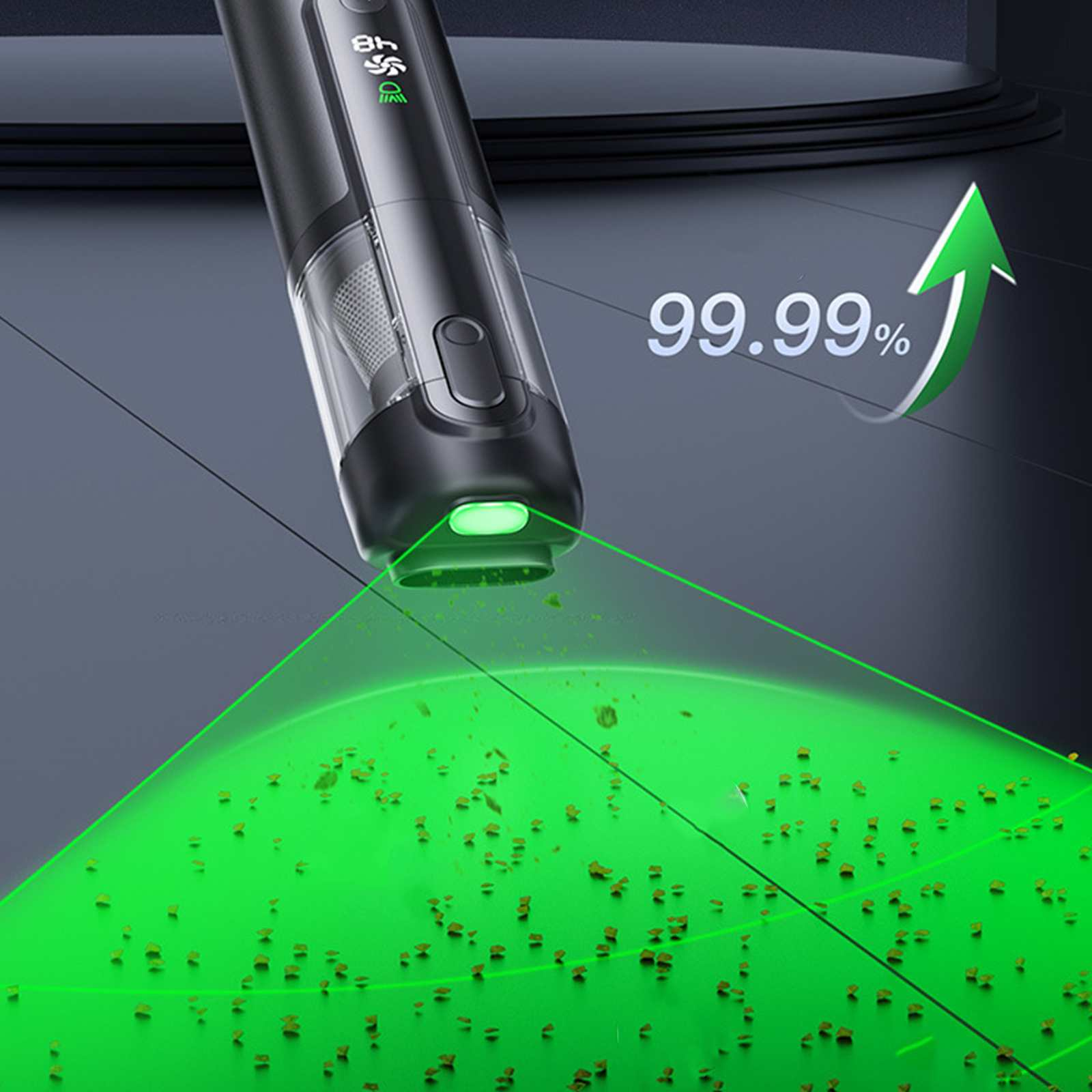 Ein Handstaubsauger strahlt grünes Licht auf Schmutz. Ein grüner Pfeil zeigt 99,99 % Reinigung an.
