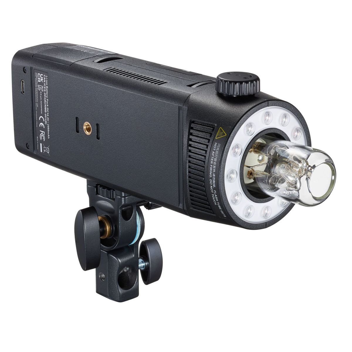 A black studio flash with a clear bulb and LED lights around it, mounted on a stand with knobs. White background.