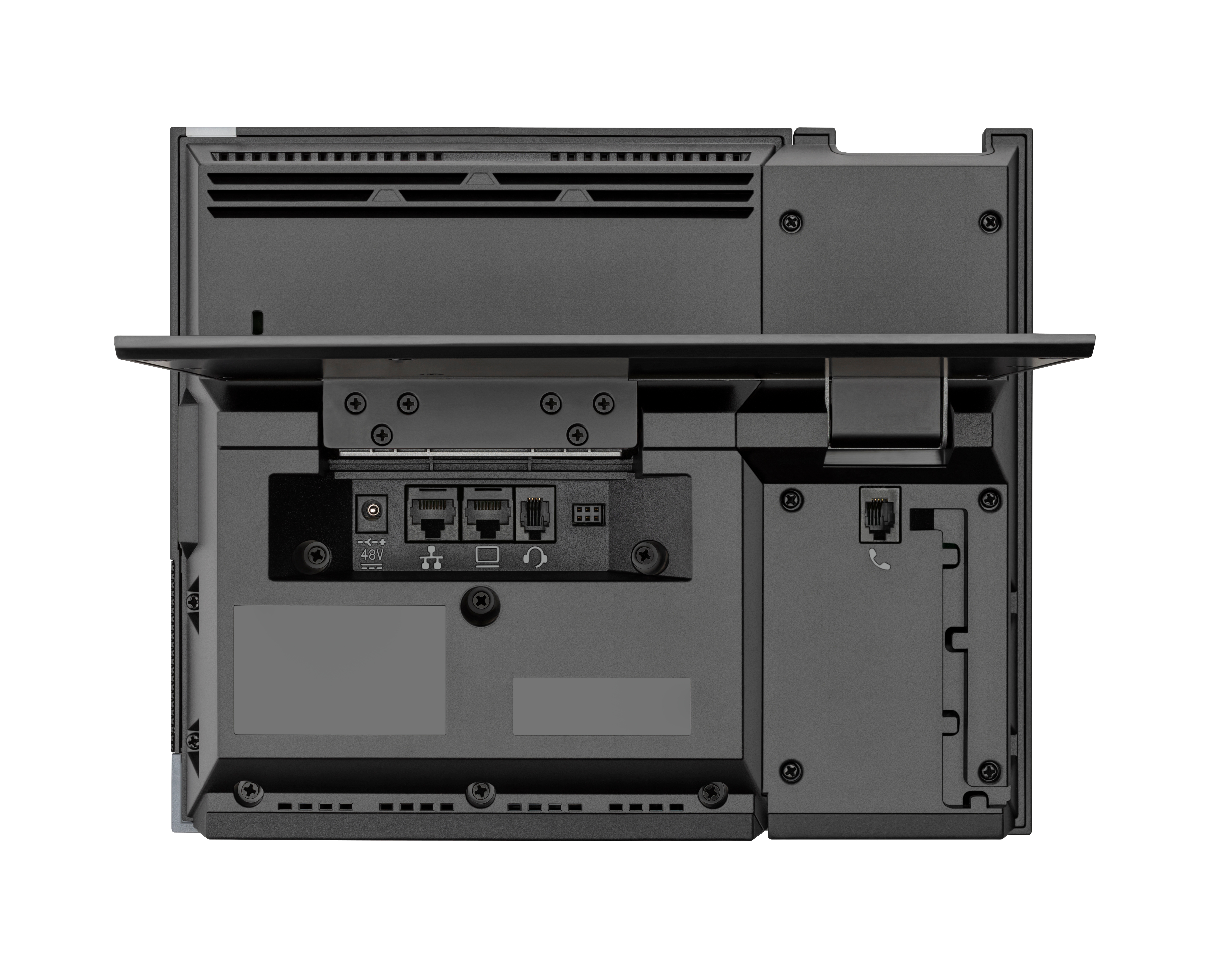 Primo piano di un dispositivo nero, probabilmente un'apparecchiatura tecnologica, che mostra varie porte, connettori e fessure di ventilazione.