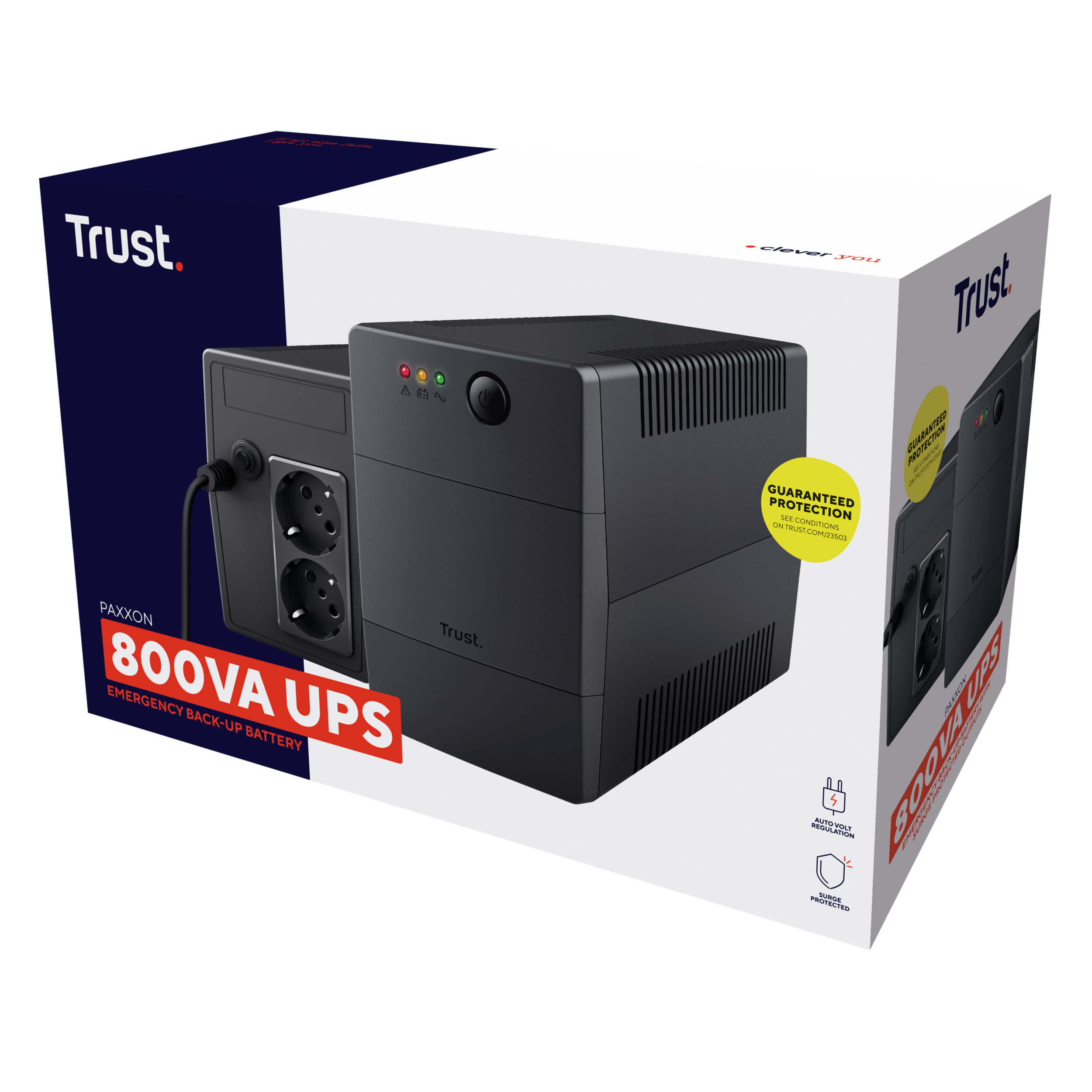 Un SAI Trust Paxxon 800VA negro en una caja blanca y azul. Tiene enchufes y luces de estado. La caja dice 'Batería de respaldo de emergencia'.