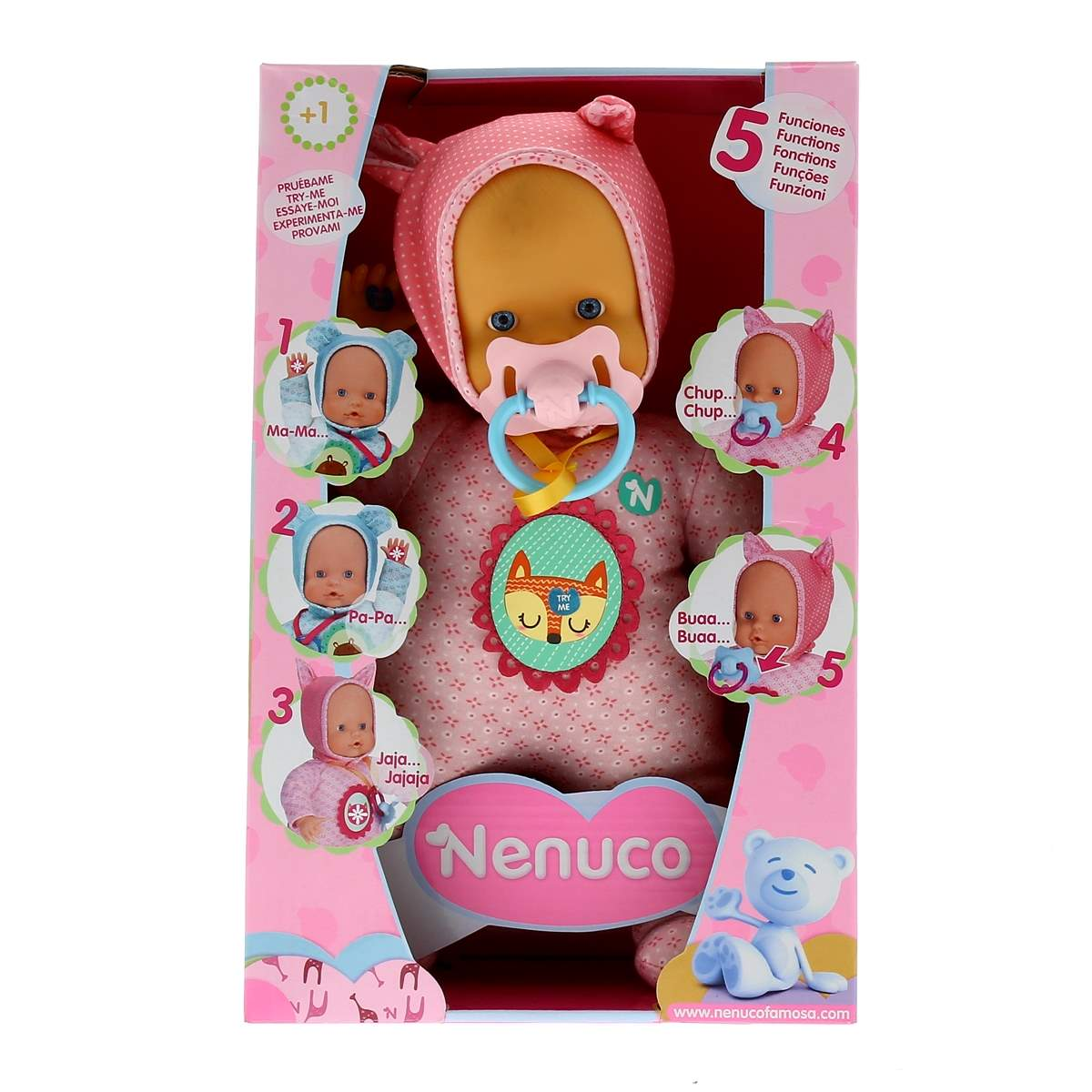 Una muñeca Nenuco en una caja rosa. La muñeca lleva un gorro rosa y tiene un chupete. La caja tiene texto en varios idiomas.