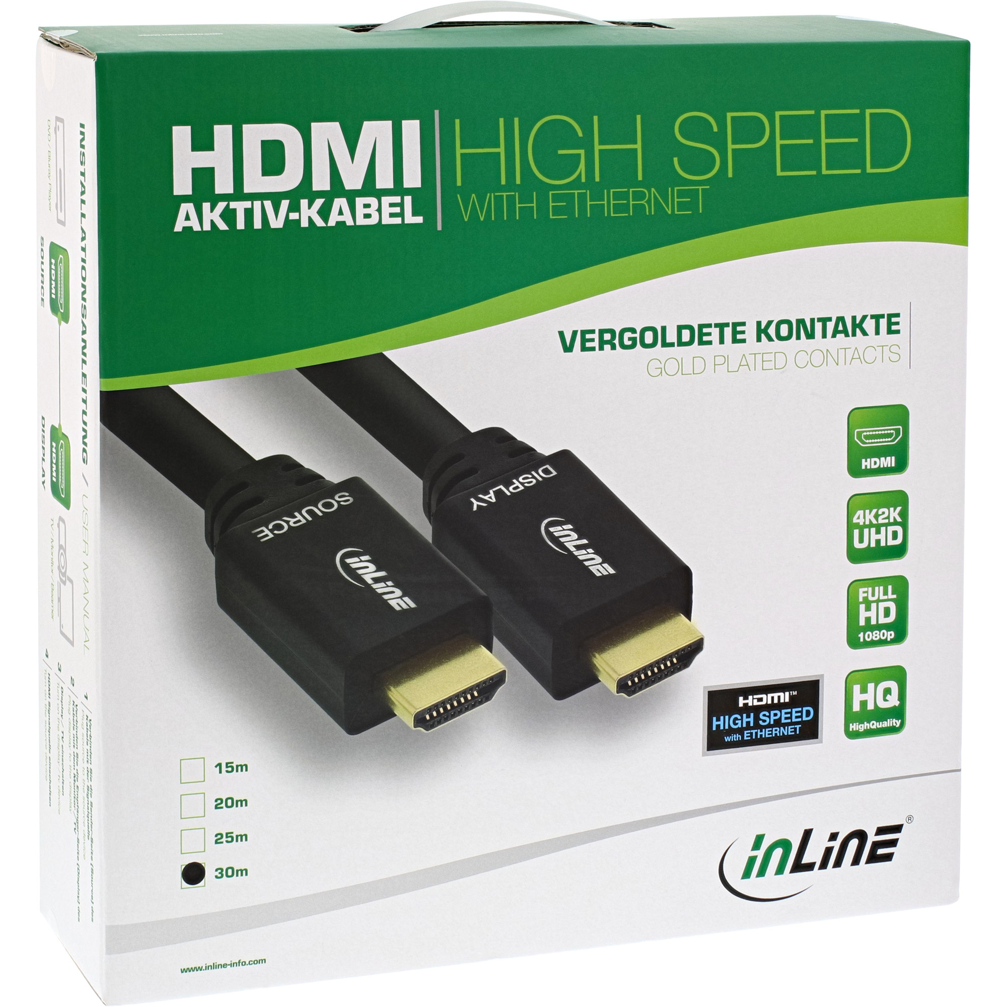 Boîte avec câbles HDMI. La boîte est verte et blanche. Les câbles sont noirs.