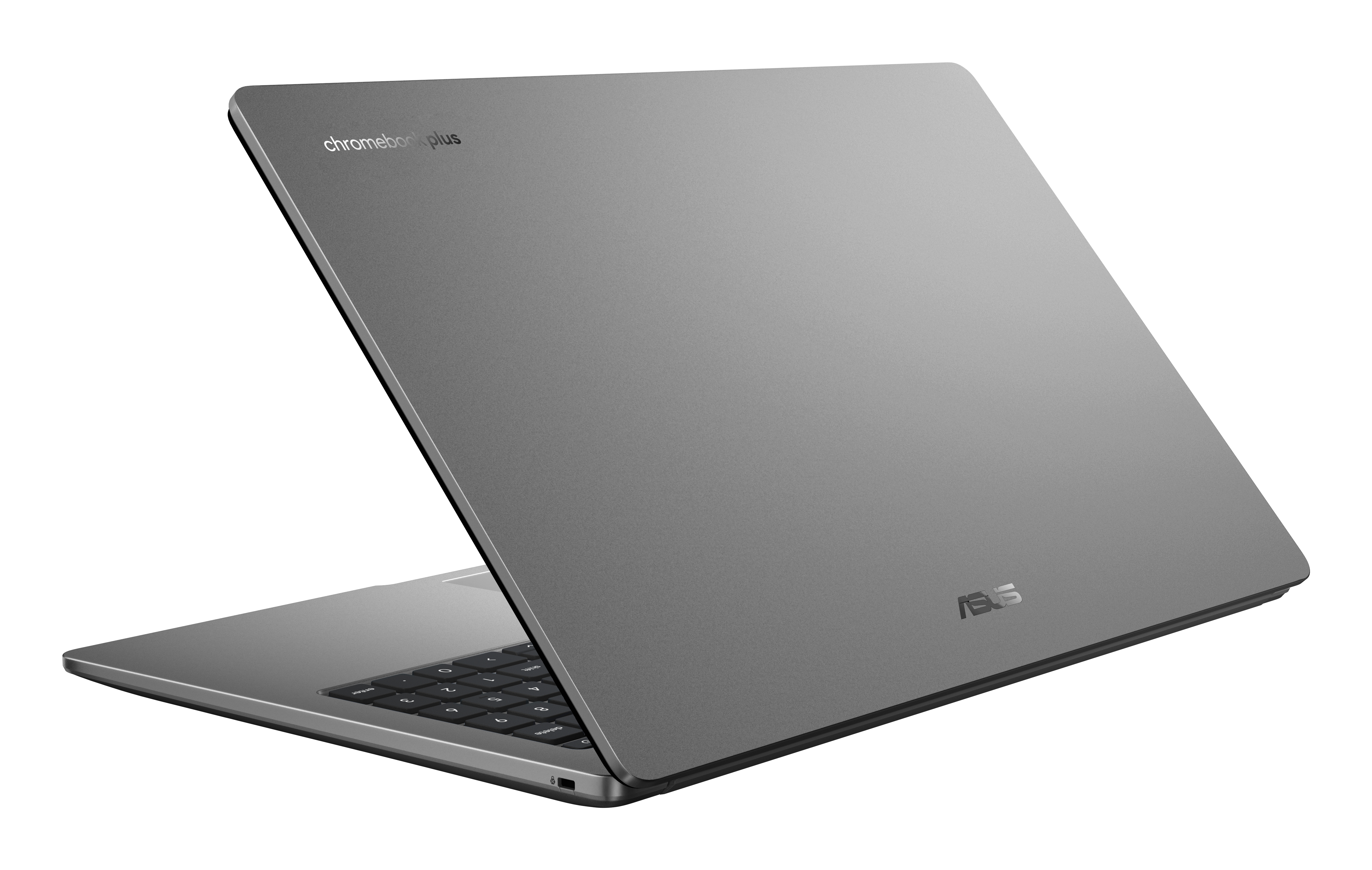 Szary laptop jest lekko otwarty, pokazując klawiaturę. Pokrywa ma logo 'Chromebook plus' i 'ASUS'.