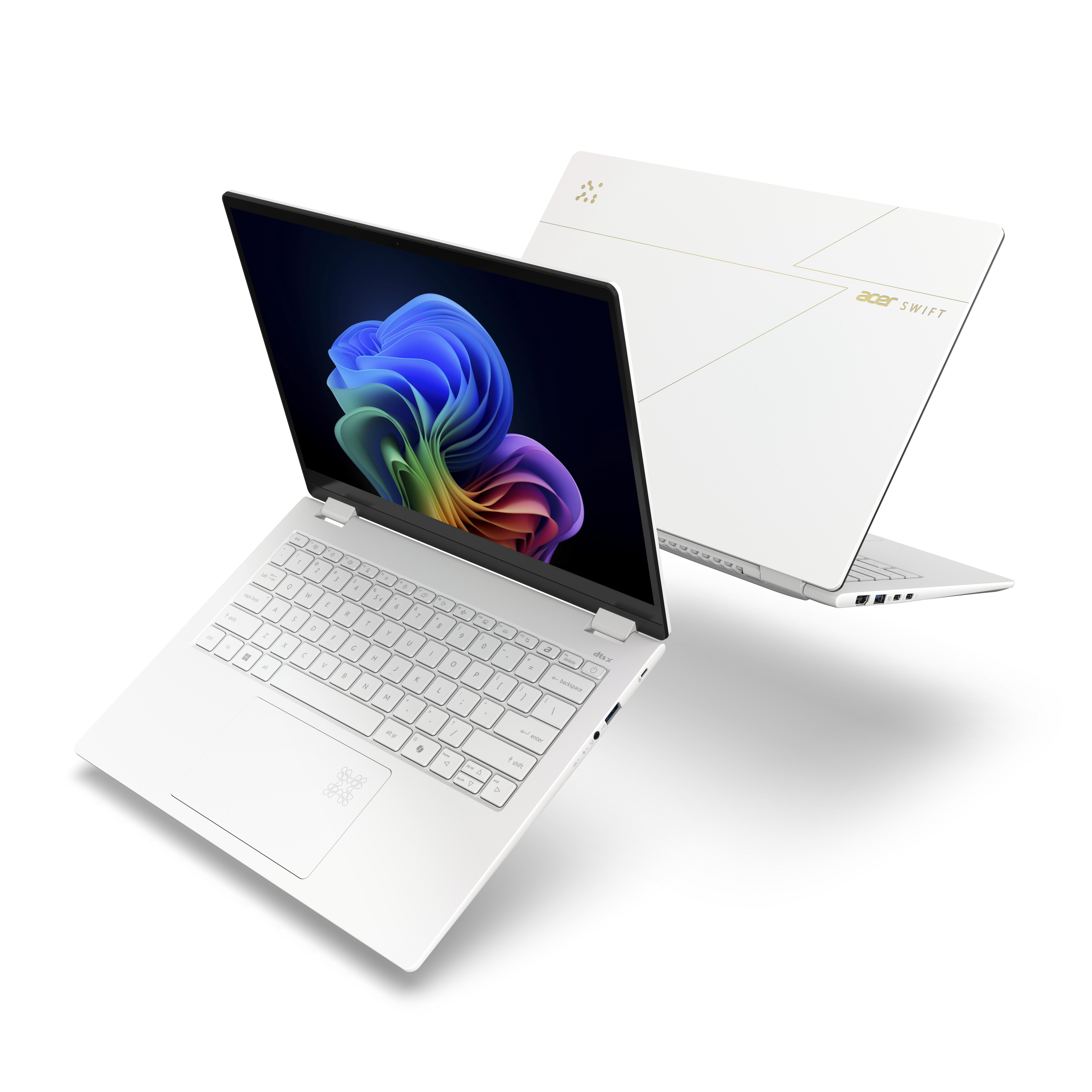 Weißes Acer Swift-Laptop. Der offene Bildschirm zeigt ein farbenfrohes abstraktes Bild. Ein anderes Laptop ist dahinter.