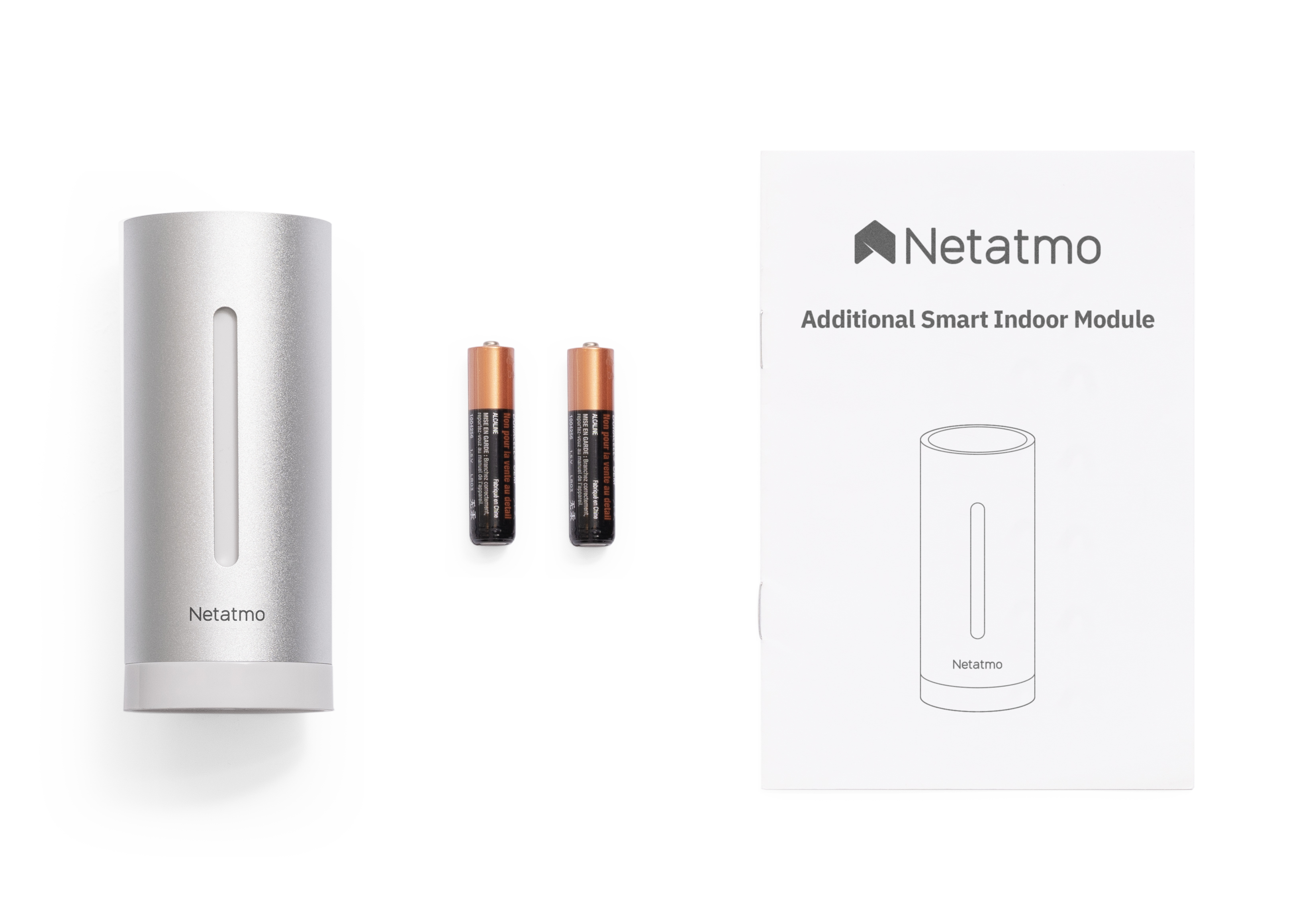A silver Netatmo device, two AA batteries, and a leaflet labeled 'Additional Smart Indoor Module'.