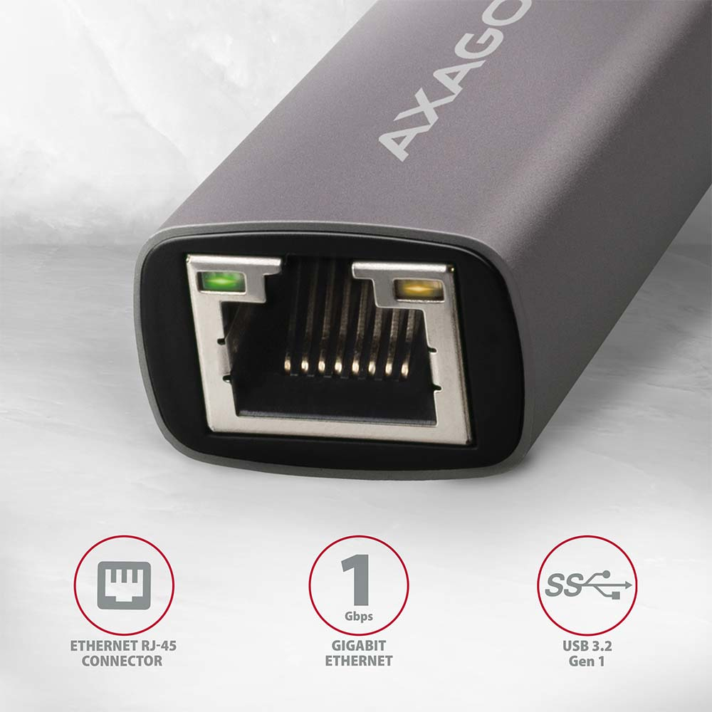 Szary adapter Ethernet Axago ze złączem RJ-45 i USB 3.2 Gen 1. Obraz zawiera również ikony Gigabit Ethernet.