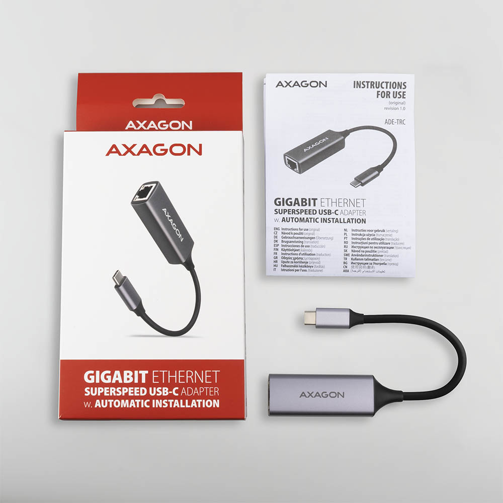 Adapter Axagon Gigabit Ethernet USB-C i opakowanie. Zawiera adapter, pudełko i instrukcje.