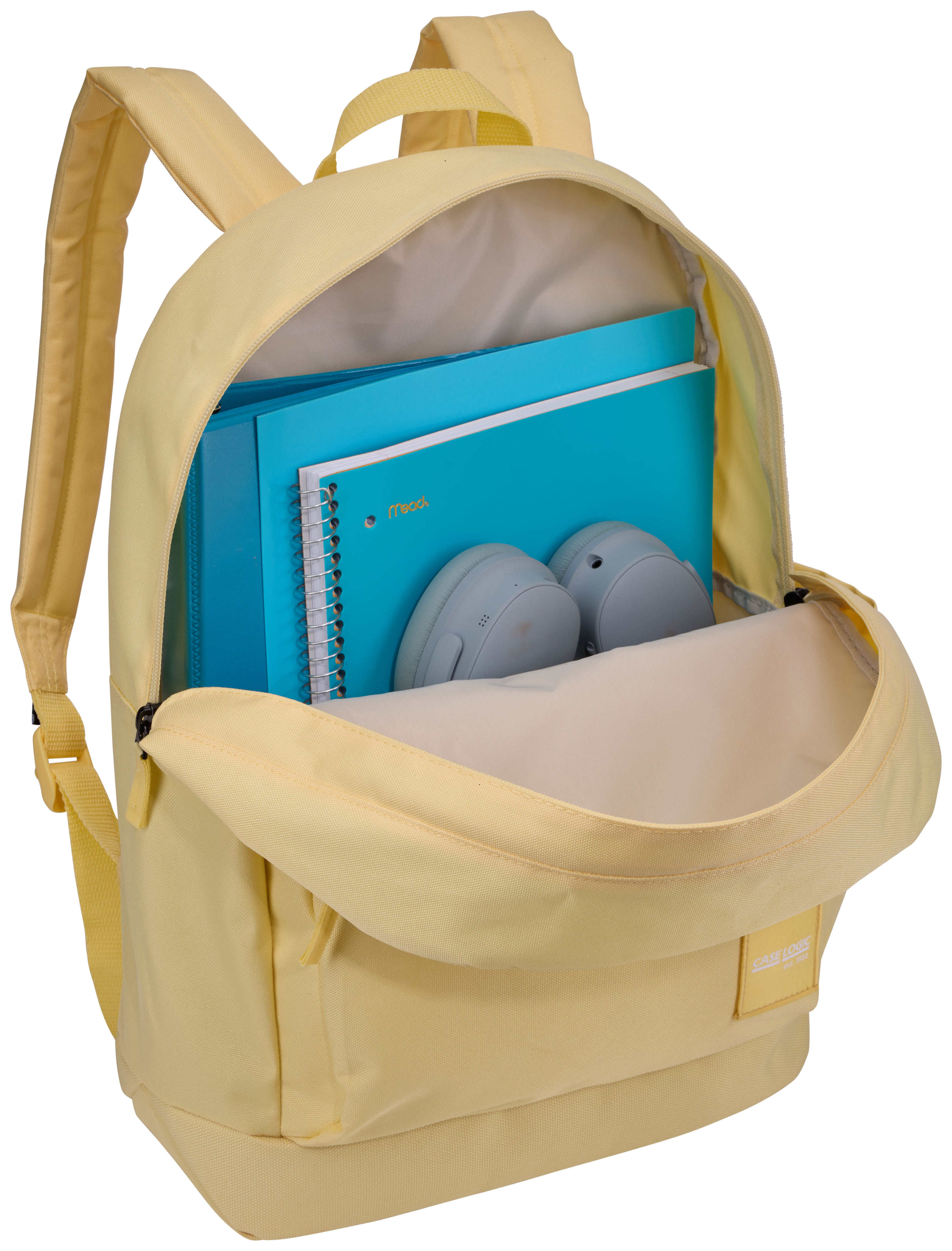 Sac à dos jaune avec compartiment ouvert. Contient des cahiers bleus et un casque gris.