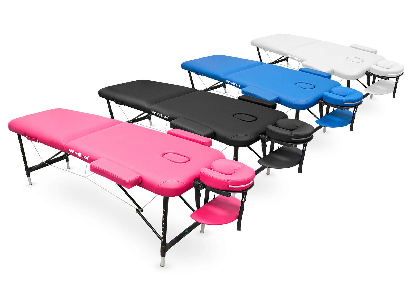 Cuatro camillas de masaje en rosa, negro, azul y blanco. Cada una tiene reposacabezas y reposabrazos, sobre fondo blanco.