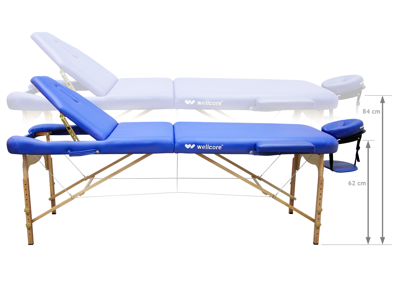 Una mesa de masaje azul con patas de madera. Detrás hay una imagen descolorida de la misma mesa. Las medidas son 84 cm y 62 cm.