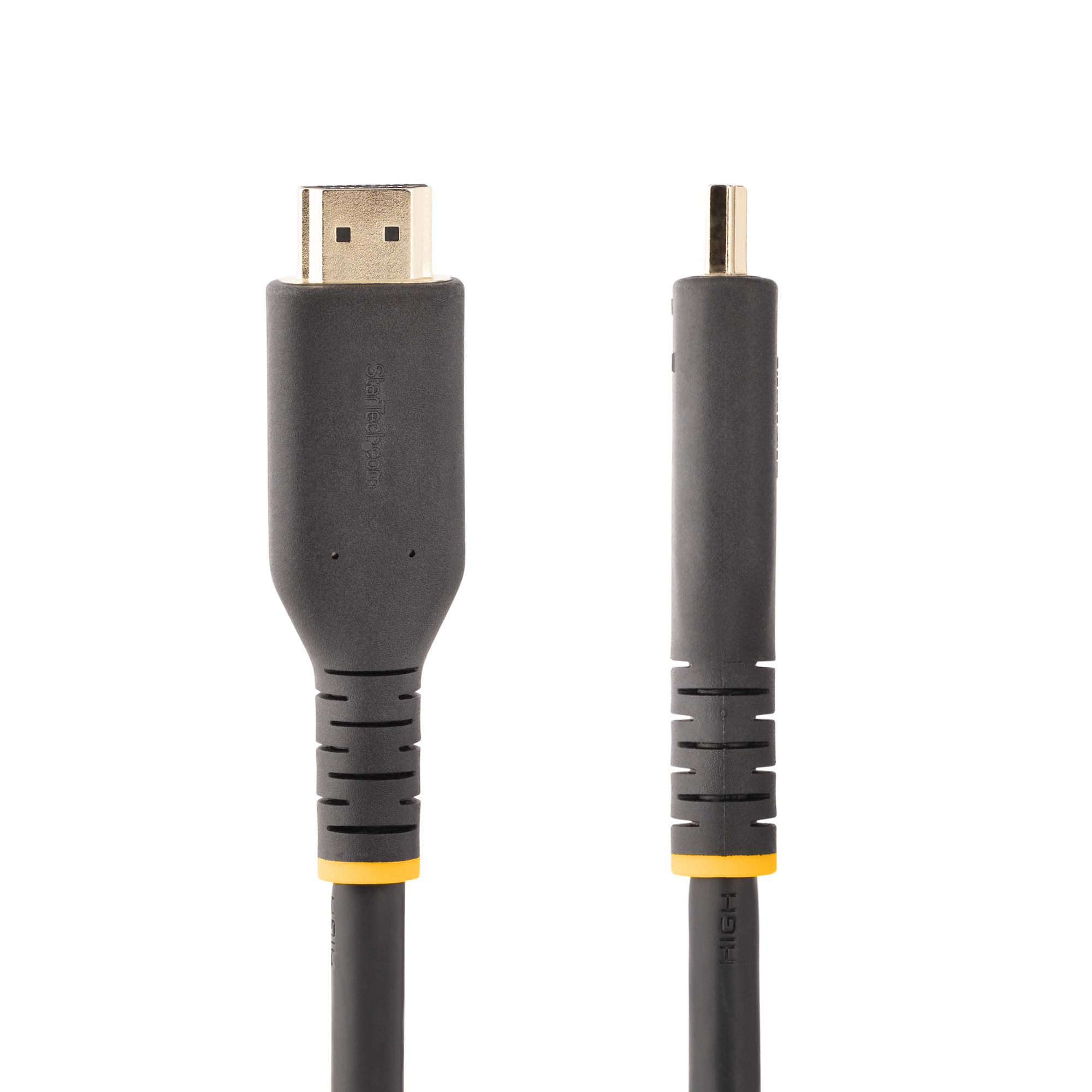 Dos cables HDMI negros con conectores dorados. Un cable está enchufado. Fondo blanco.