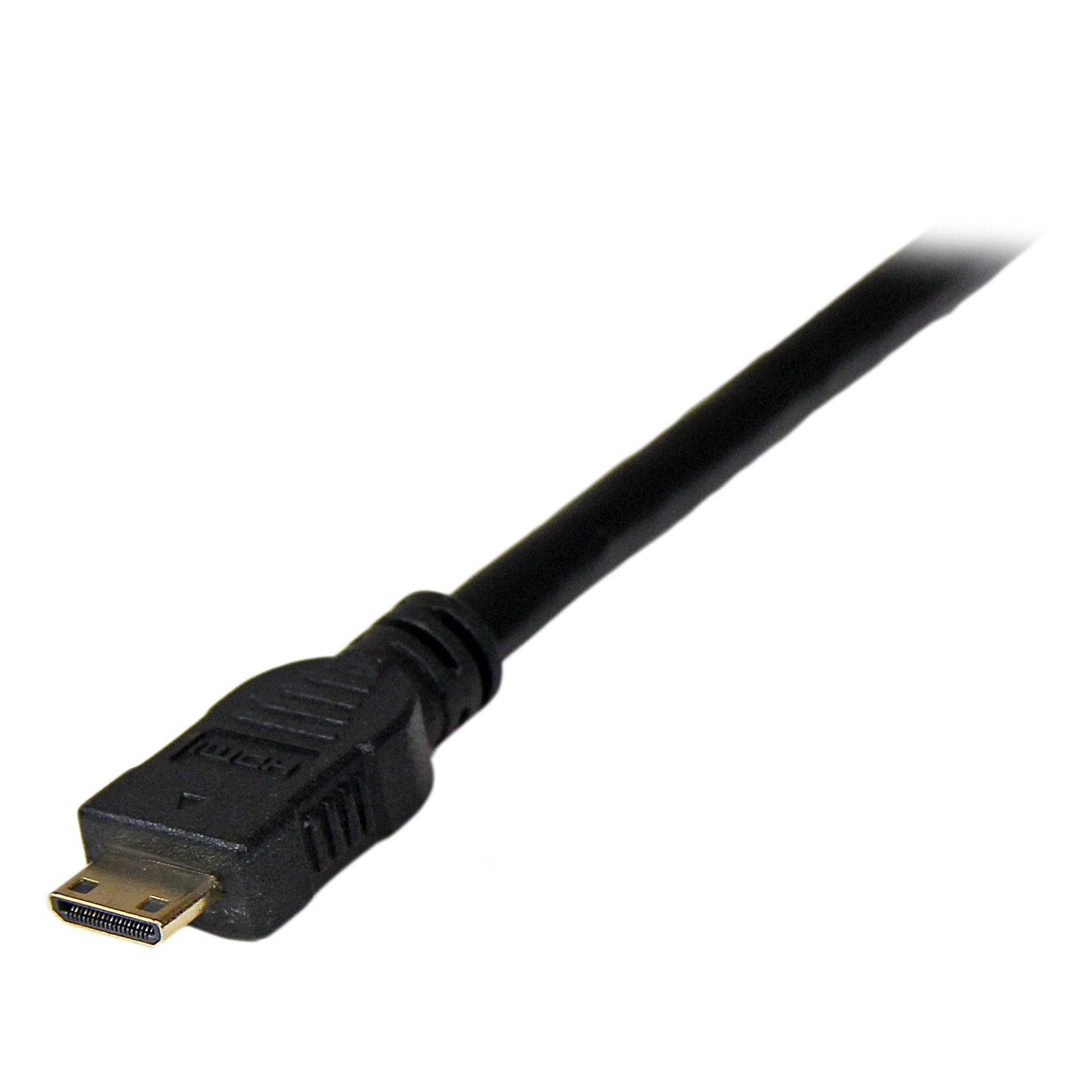 Un cable HDMI. El conector es negro y dorado. El cable es negro y está en ángulo.