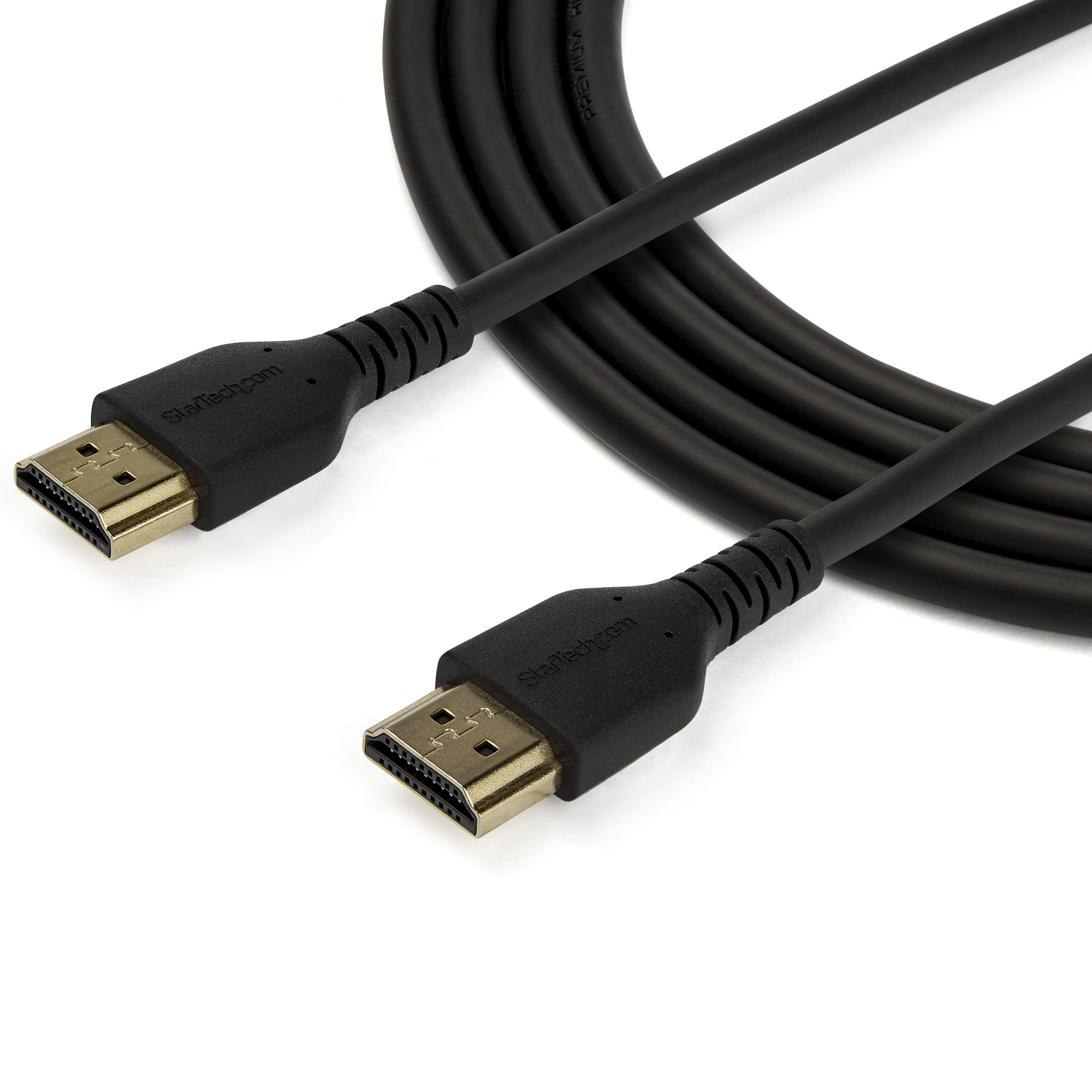 Dos cables HDMI negros con conectores dorados sobre fondo blanco. Cables etiquetados StarTech.com.