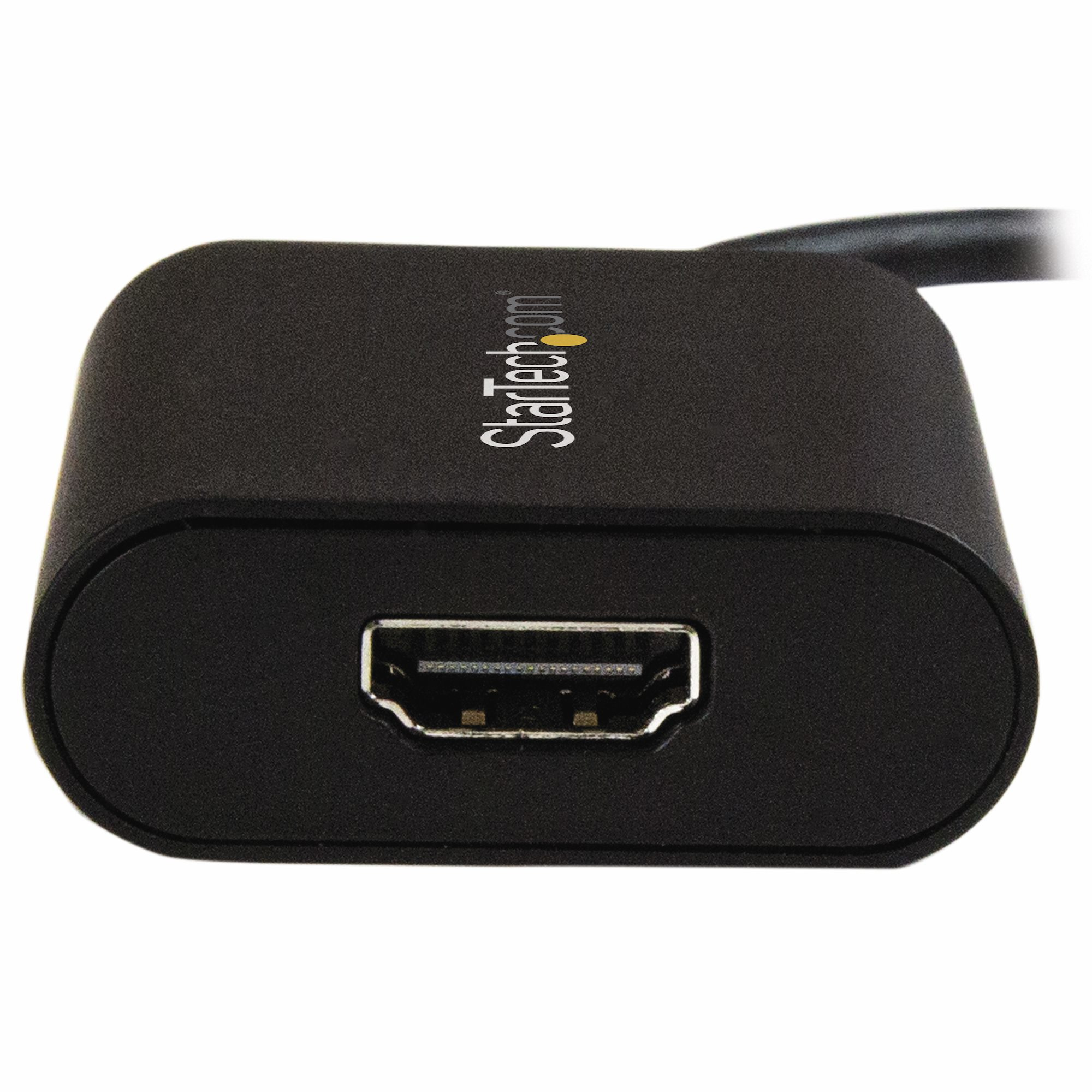 Un adaptador HDMI negro con el logotipo de StarTech.com. Tiene un puerto HDMI hembra. El fondo es blanco.
