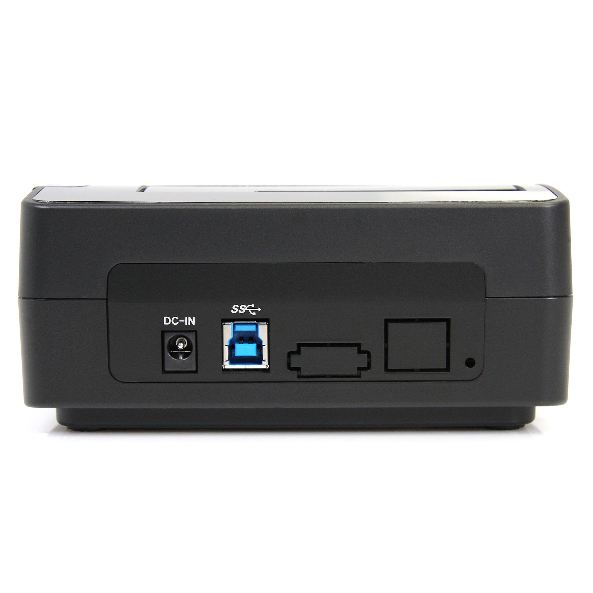 Ein schwarzes Gerät mit Anschlüssen: DC-IN, USB und andere. Weißer Hintergrund.