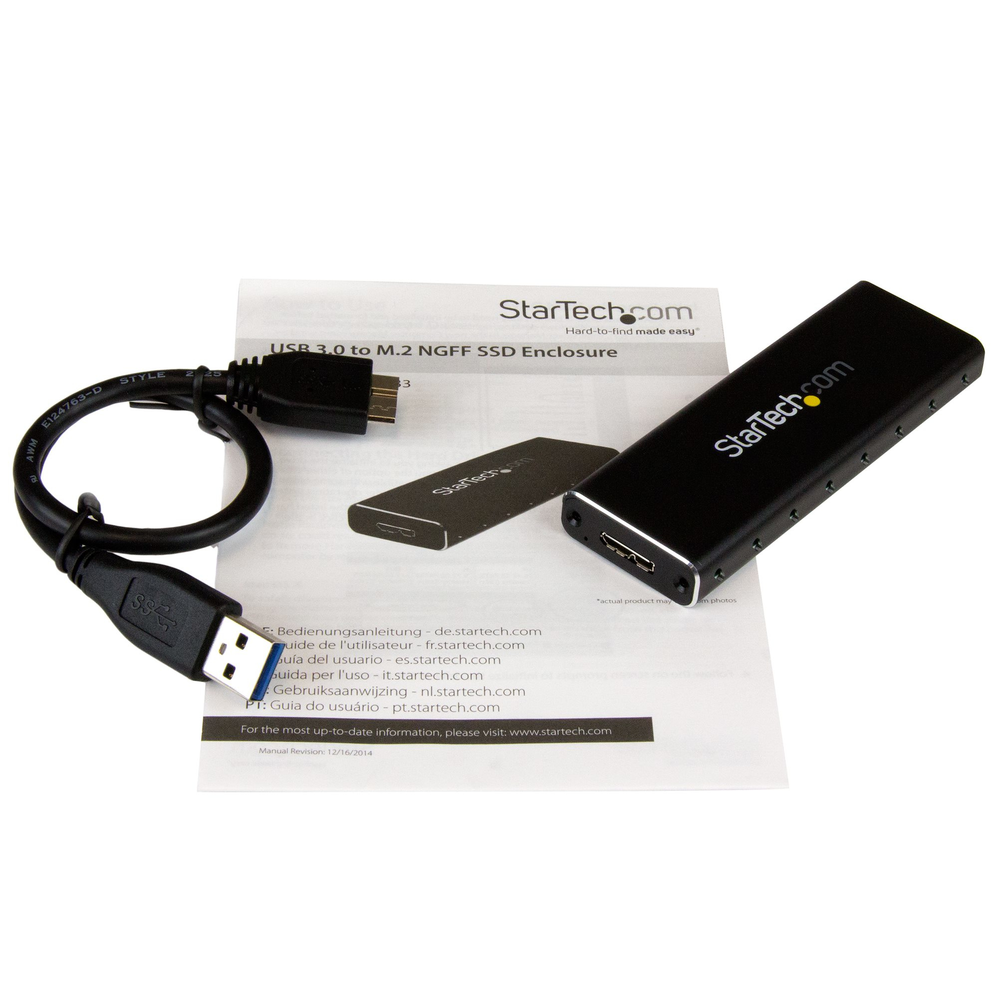 Das Bild zeigt ein schwarzes StarTech.com USB 3.0-zu-M.2-NGFF-SSD-Gehäuse, Kabel und Handbuch auf weißem Hintergrund.