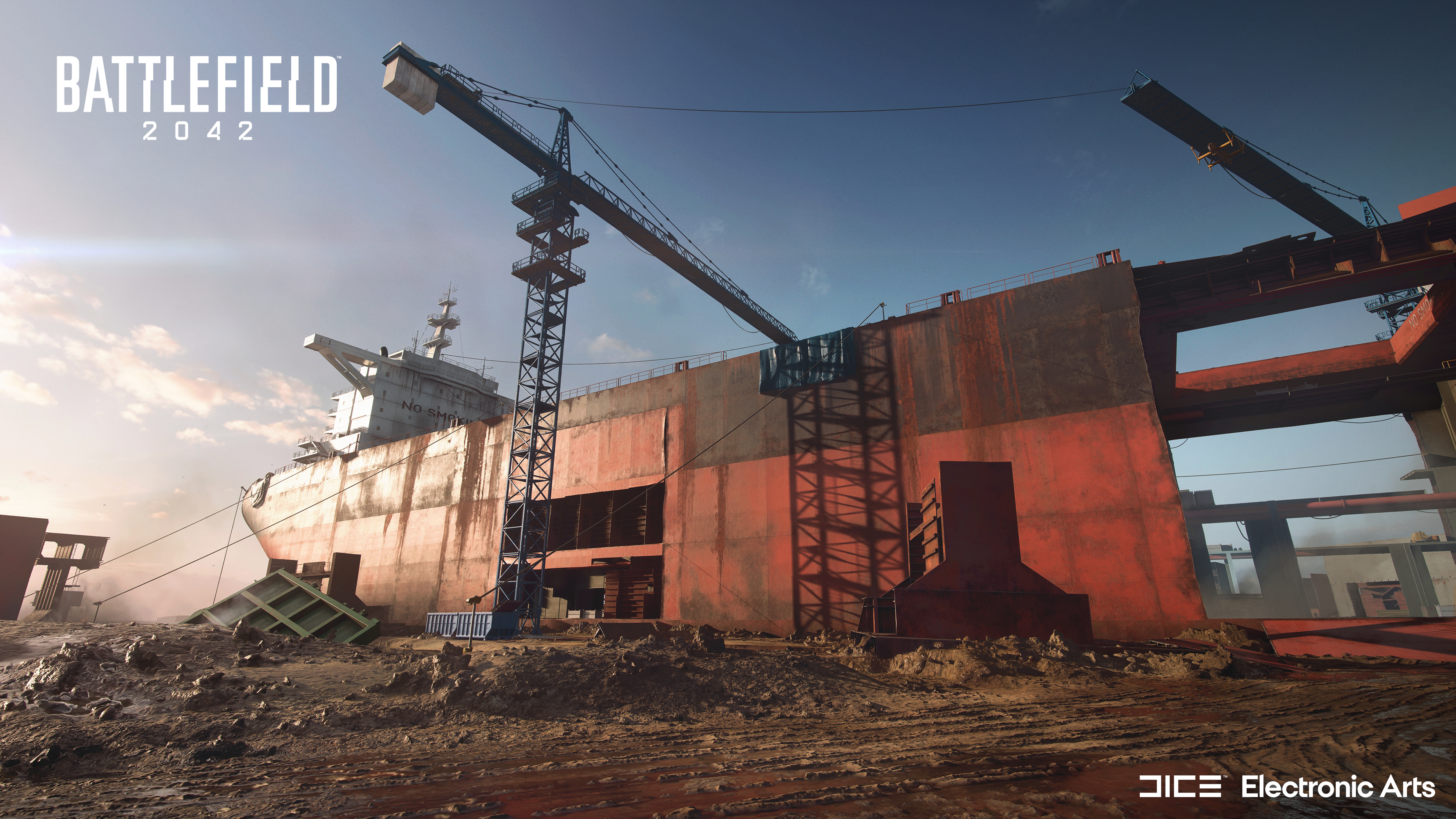 Duży statek, dźwigi i konstrukcje przemysłowe. Niebo jest niebieskie, a scena rozgrywa się na zewnątrz. Widoczne logo Battlefield 2042.
