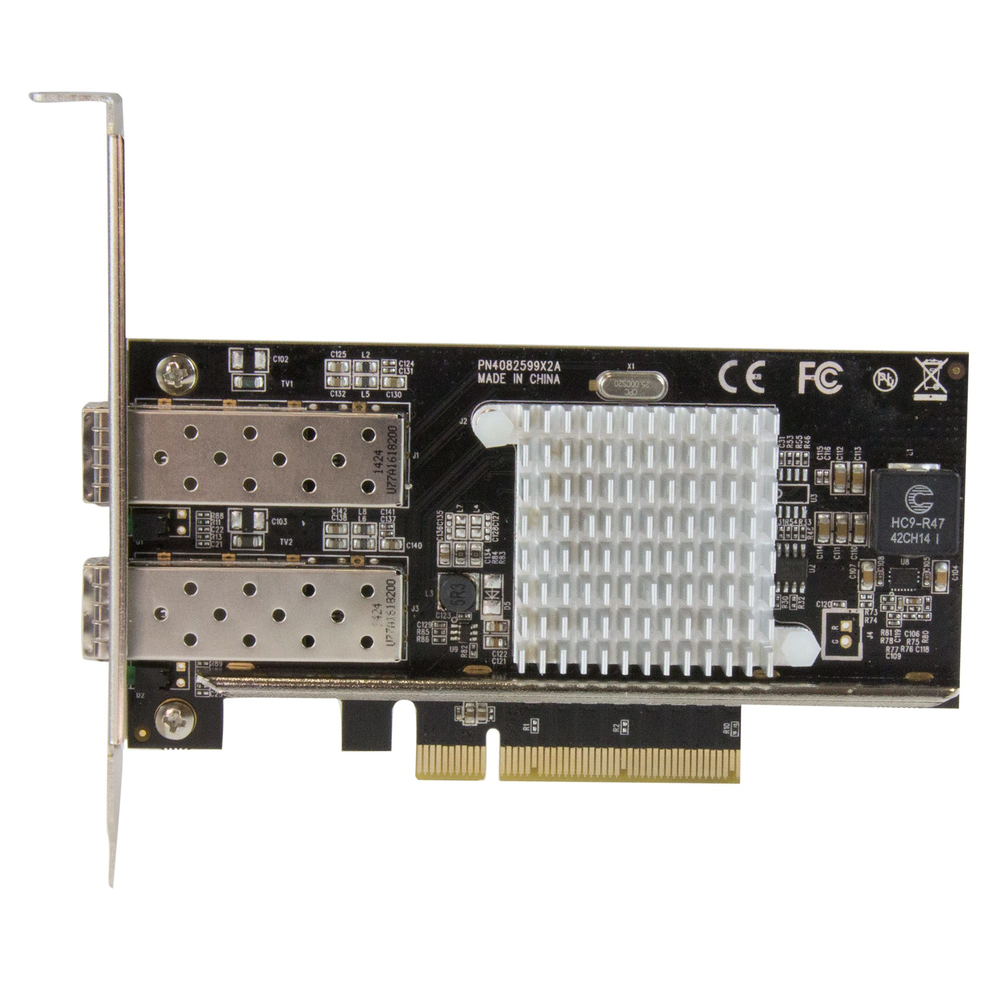 Una placa de circuito con múltiples componentes, conectores y un disipador de calor. Tiene etiquetas de texto y está contra un fondo blanco.