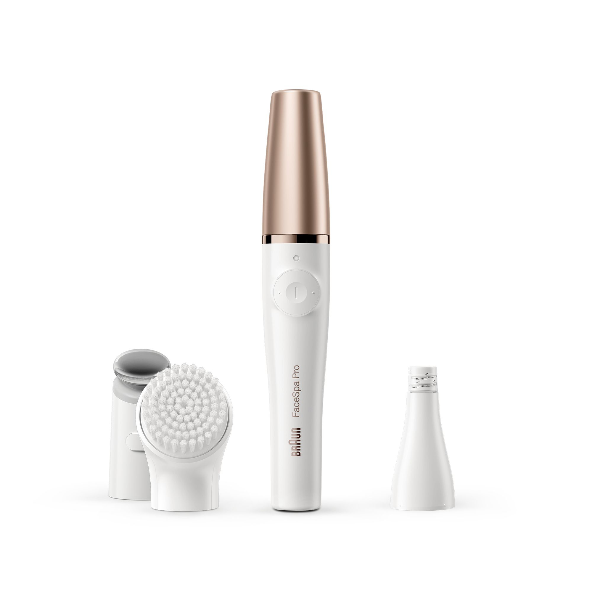 Ein weißes Braun FaceSpa Pro mit roségoldenen Akzenten und drei Aufsätzen auf weißem Hintergrund.